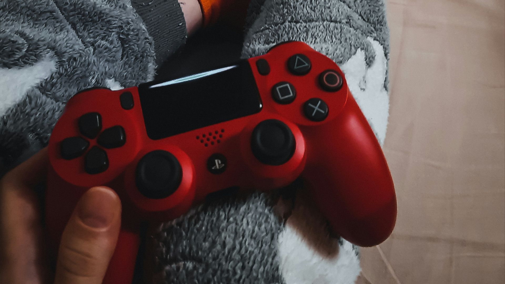 person wearing orange and gray socks