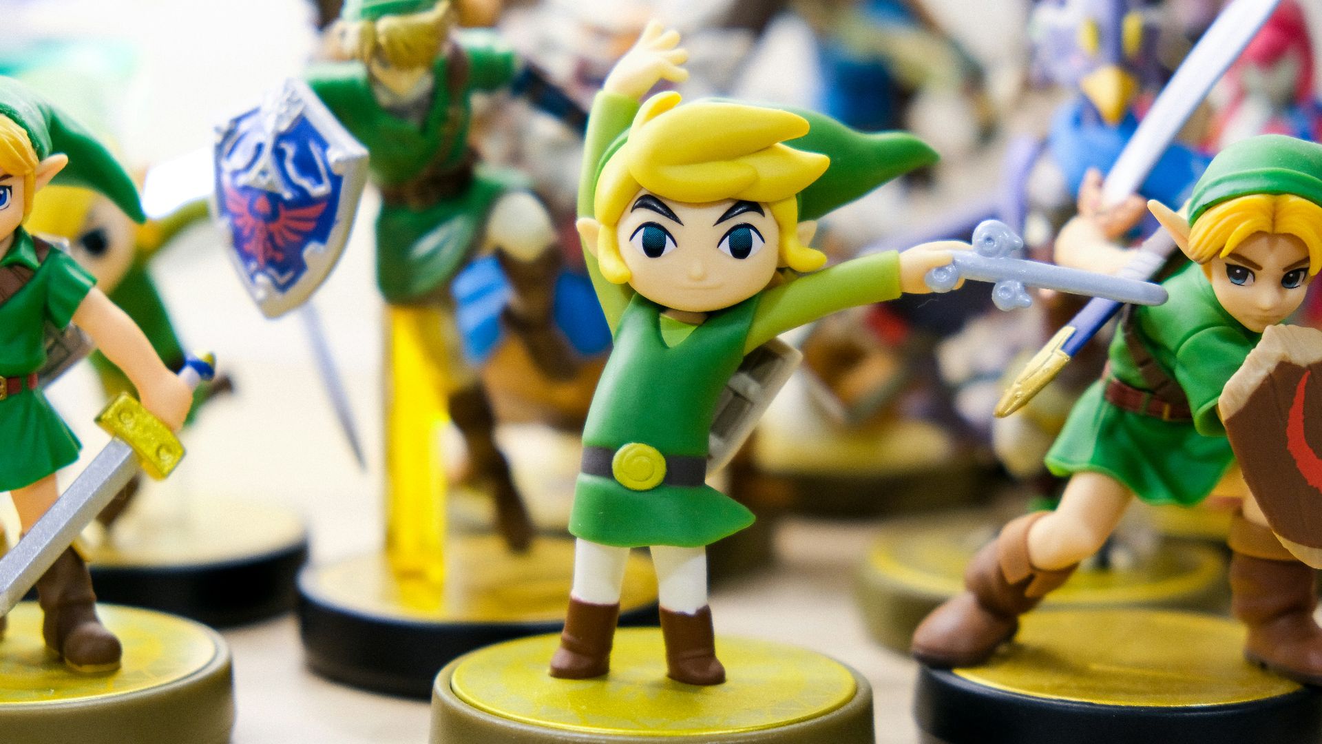 selective focus photography of Link vinyl figures