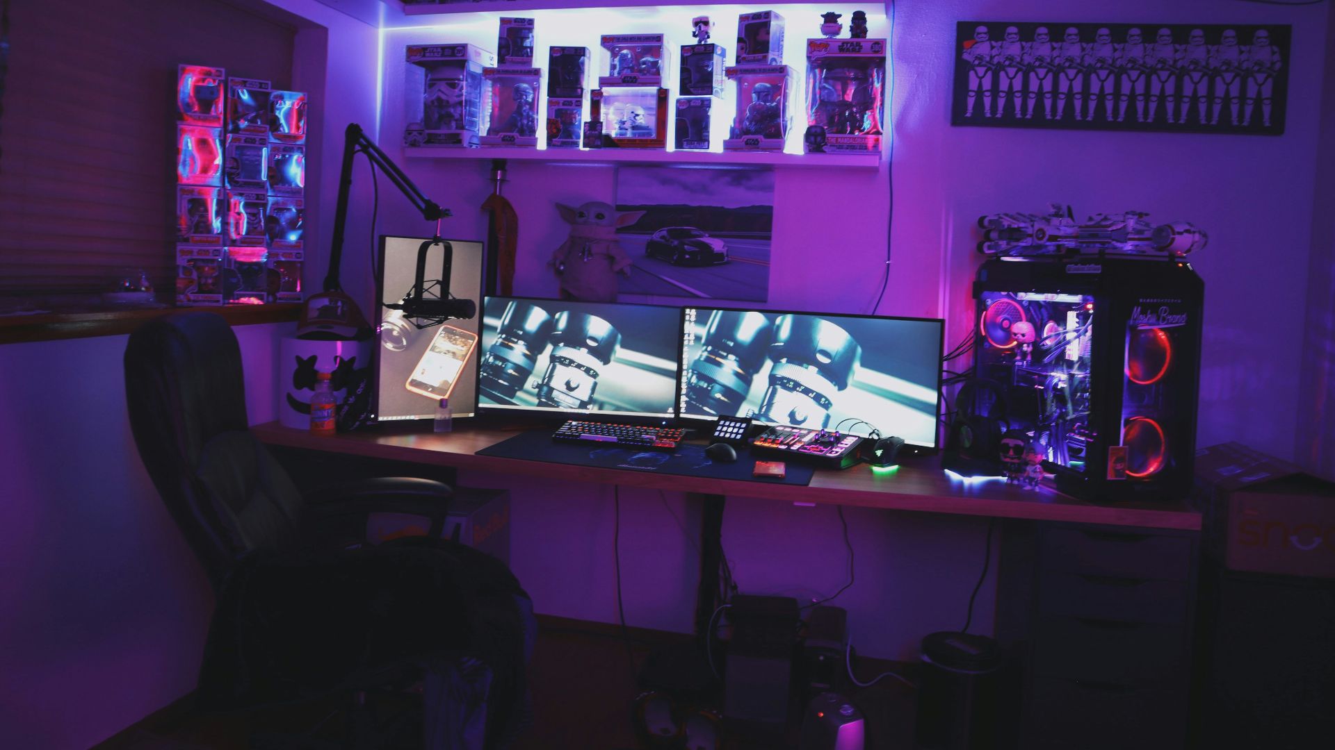 black flat screen tv on black wooden table