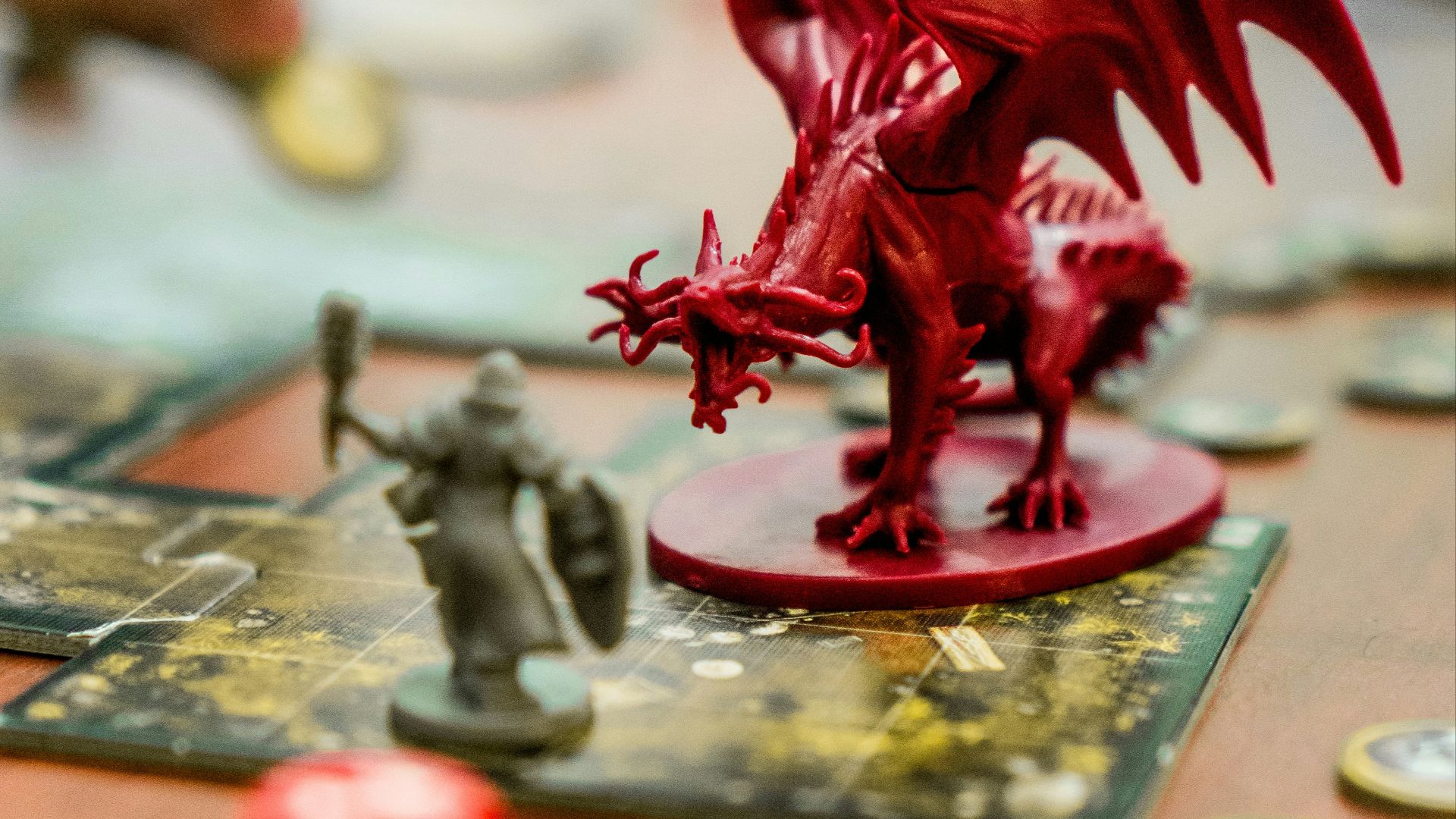red dragon action figure on table