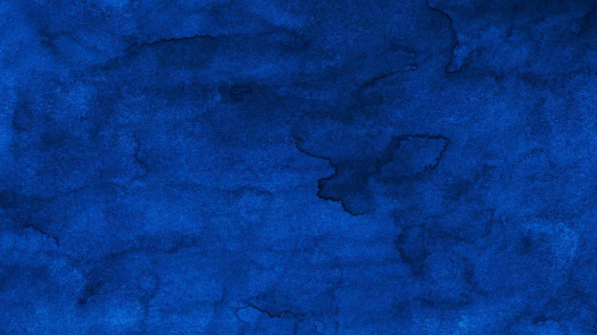 a dark blue background with a rough texture