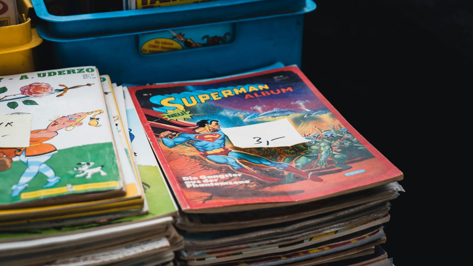 a stack of children's books sitting on top of a table