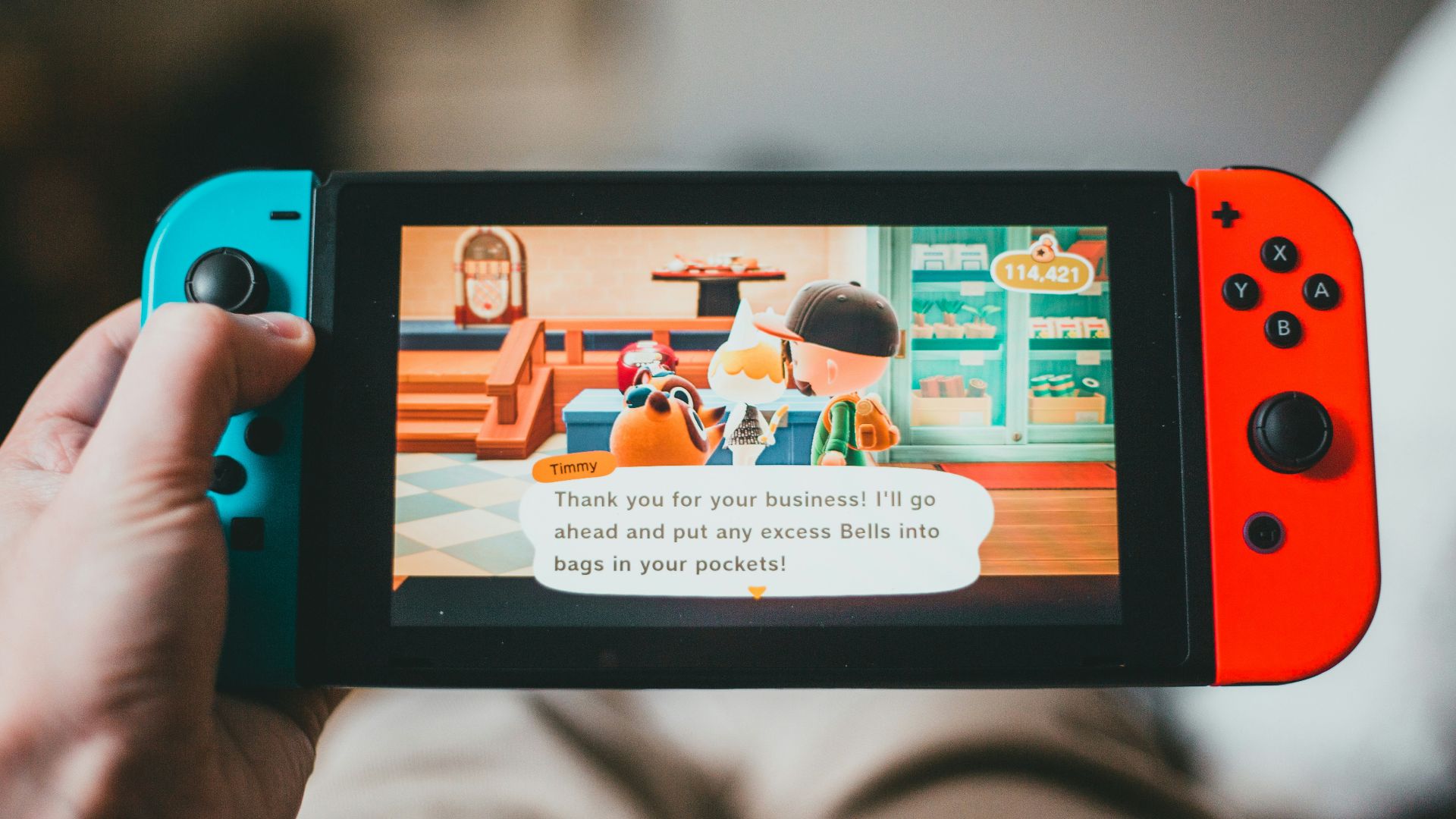 black android smartphone displaying man in white shirt