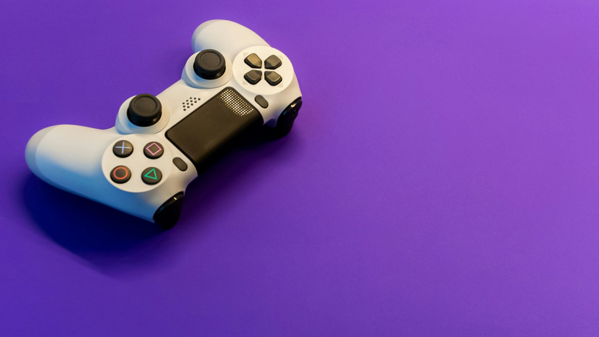 white and black game controller