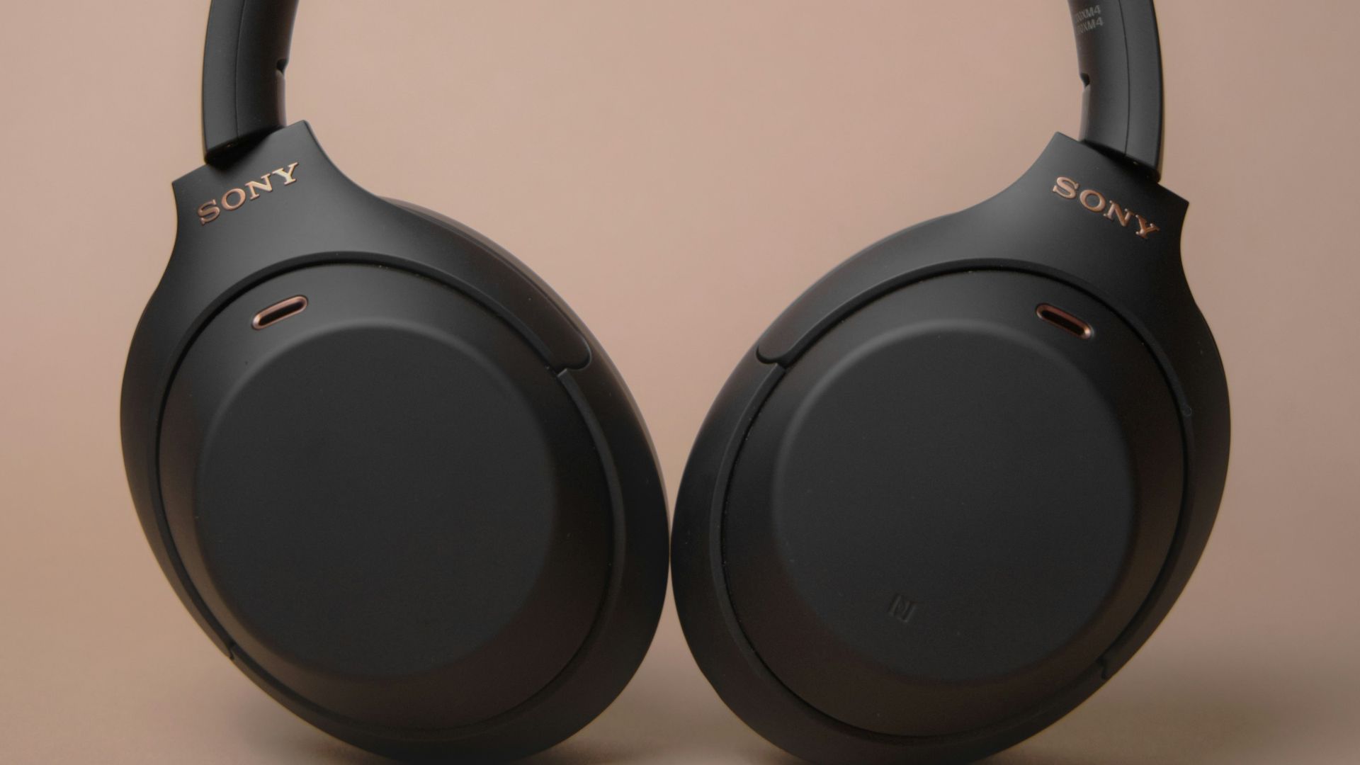 black wireless headphones on white table