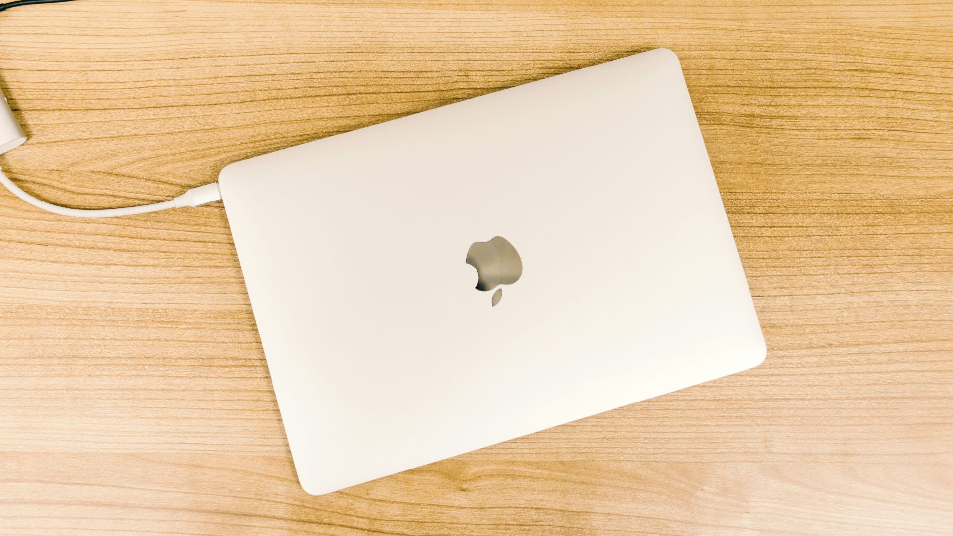 MacBook in flat lay photography with white case