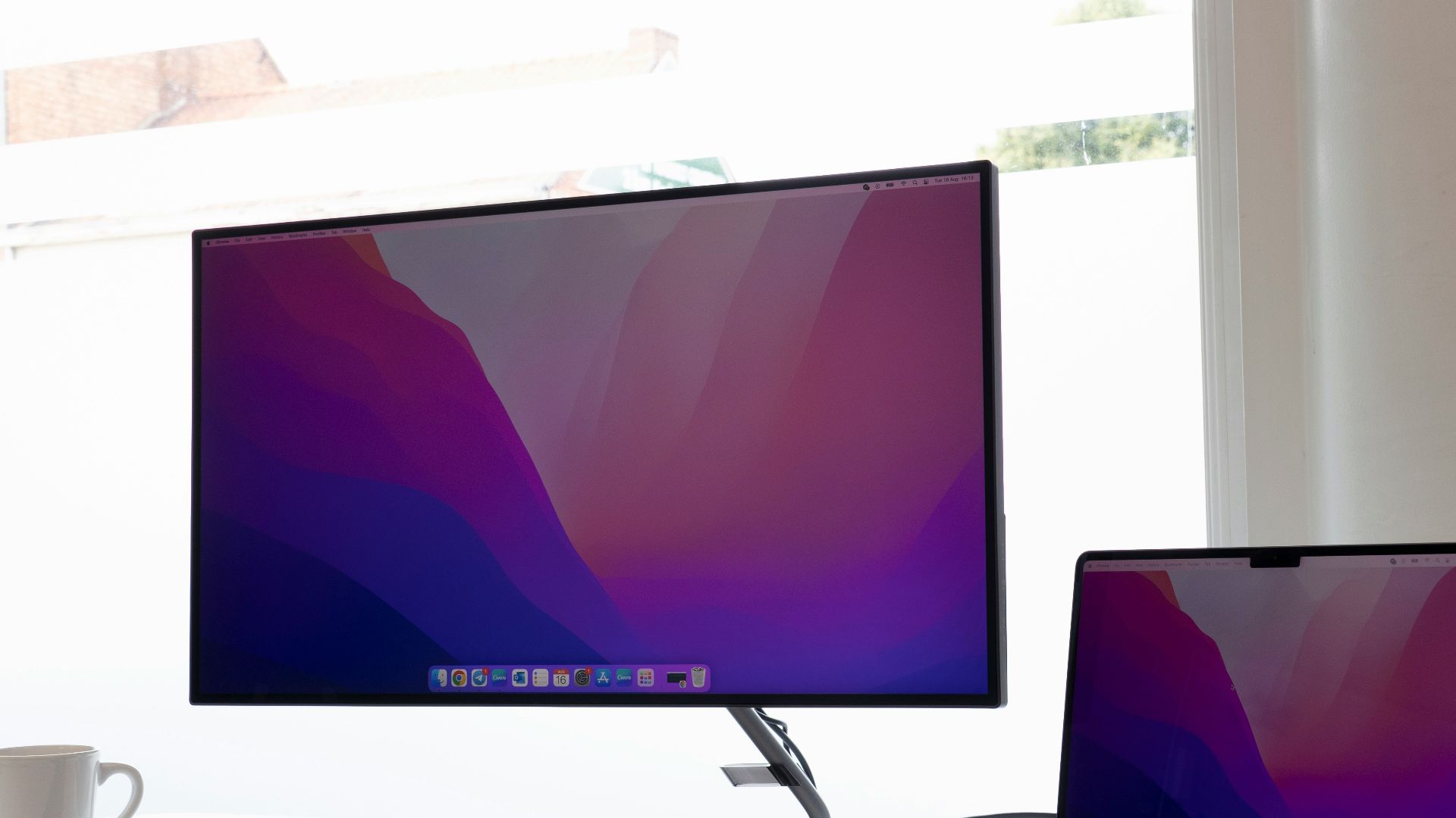 a laptop and a desktop computer