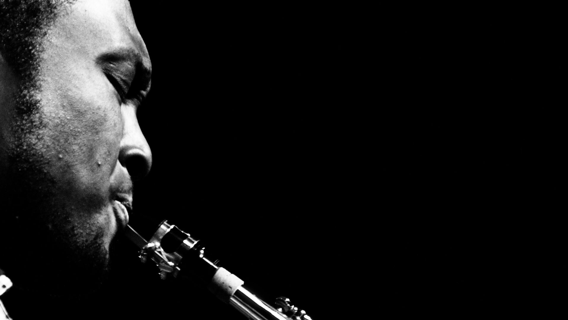 man playing saxophone