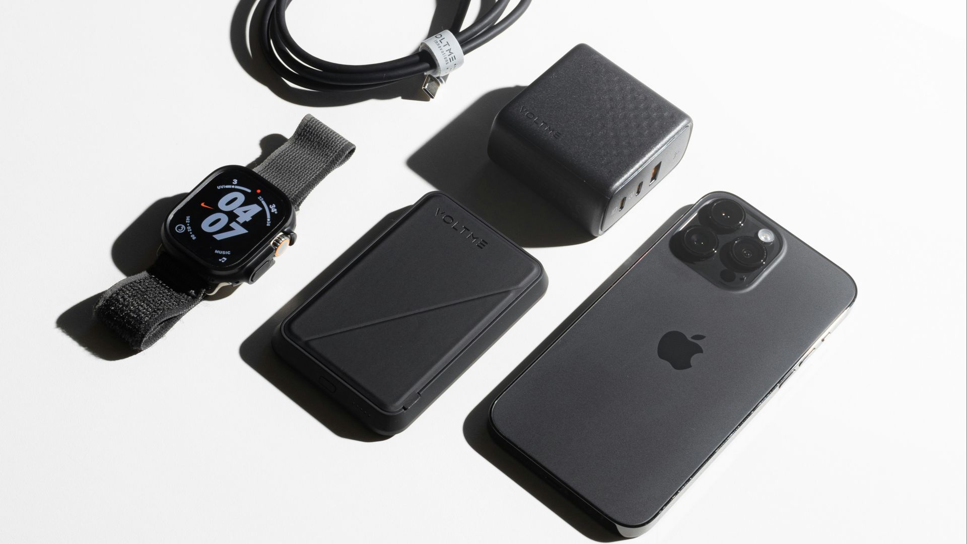 a cell phone with a charger and a charger attached to it