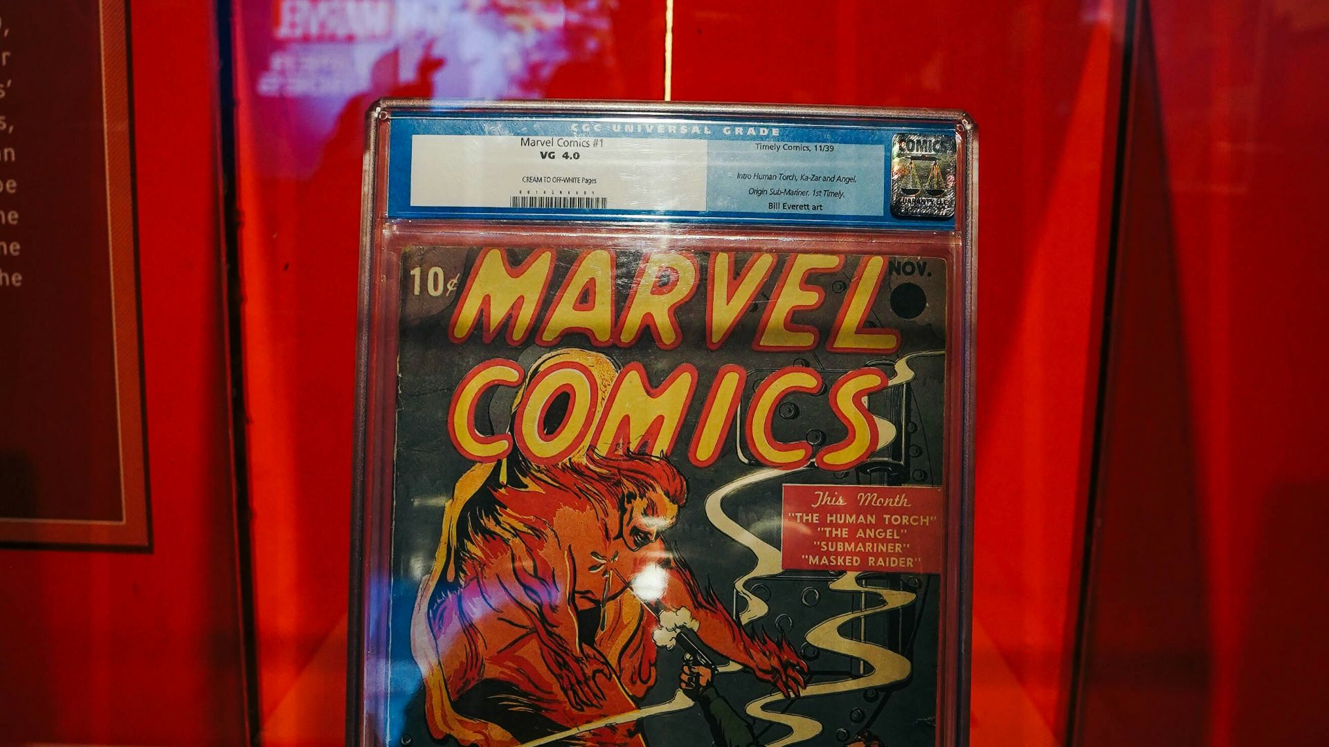 a comic book on display in a glass case