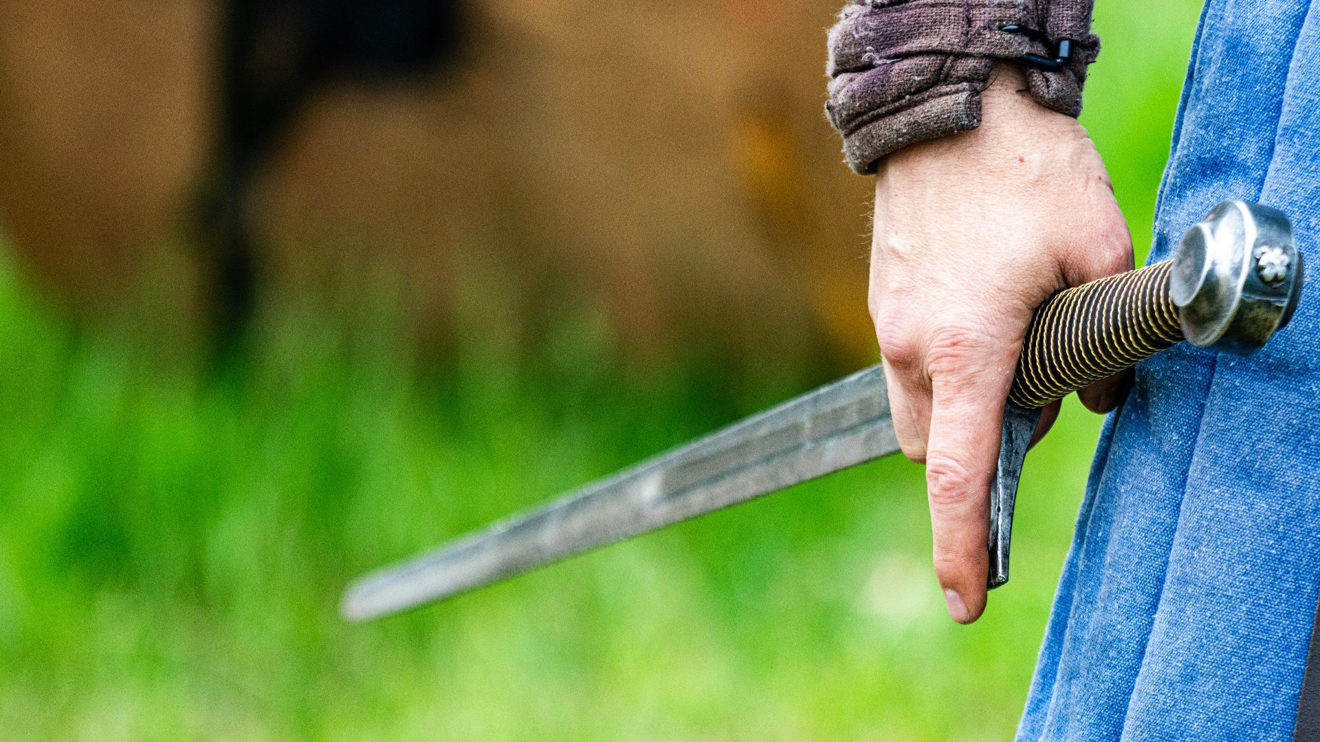 a person holding a knife in their hand
