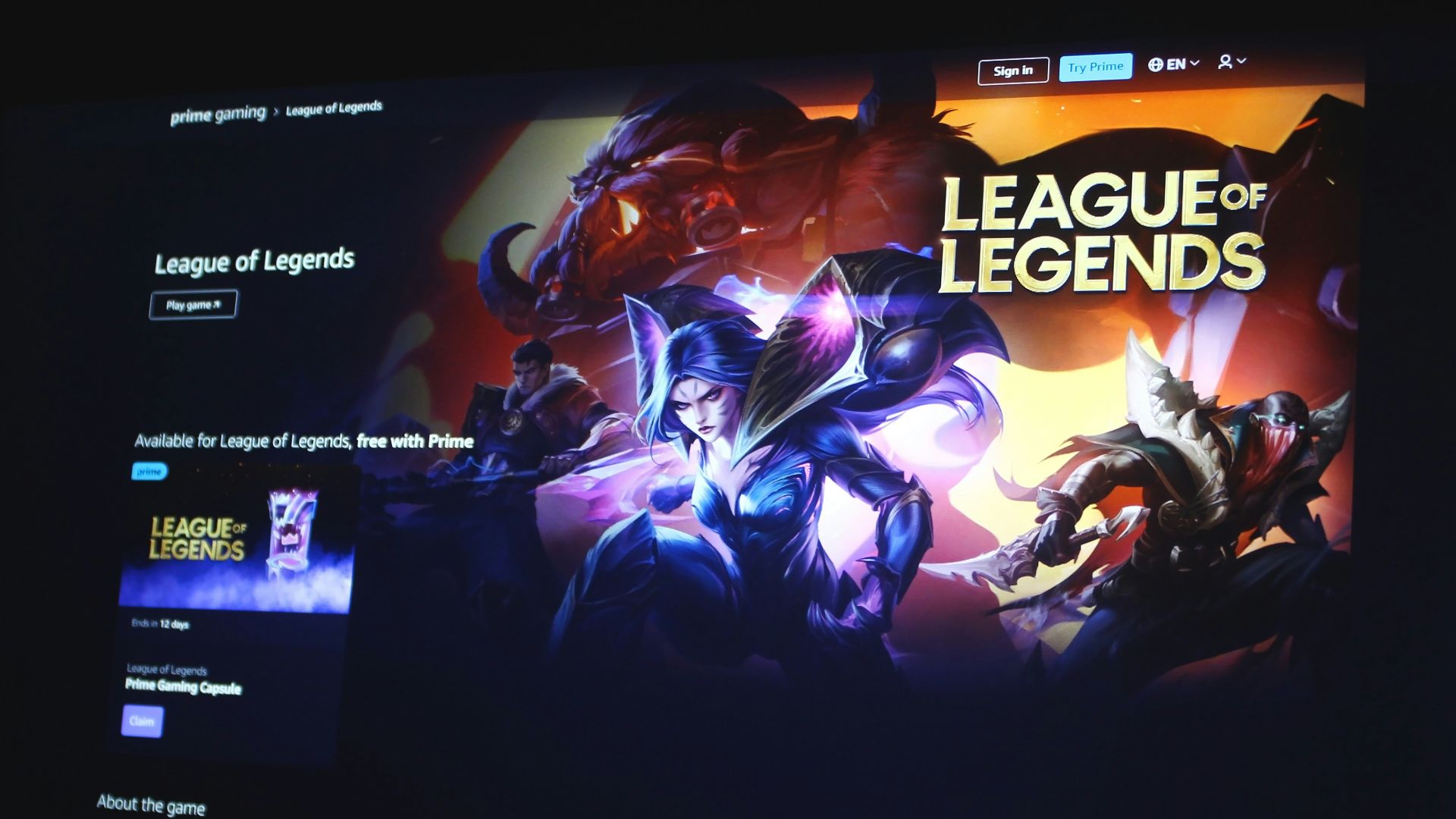 a computer screen with a league of legend logo on it