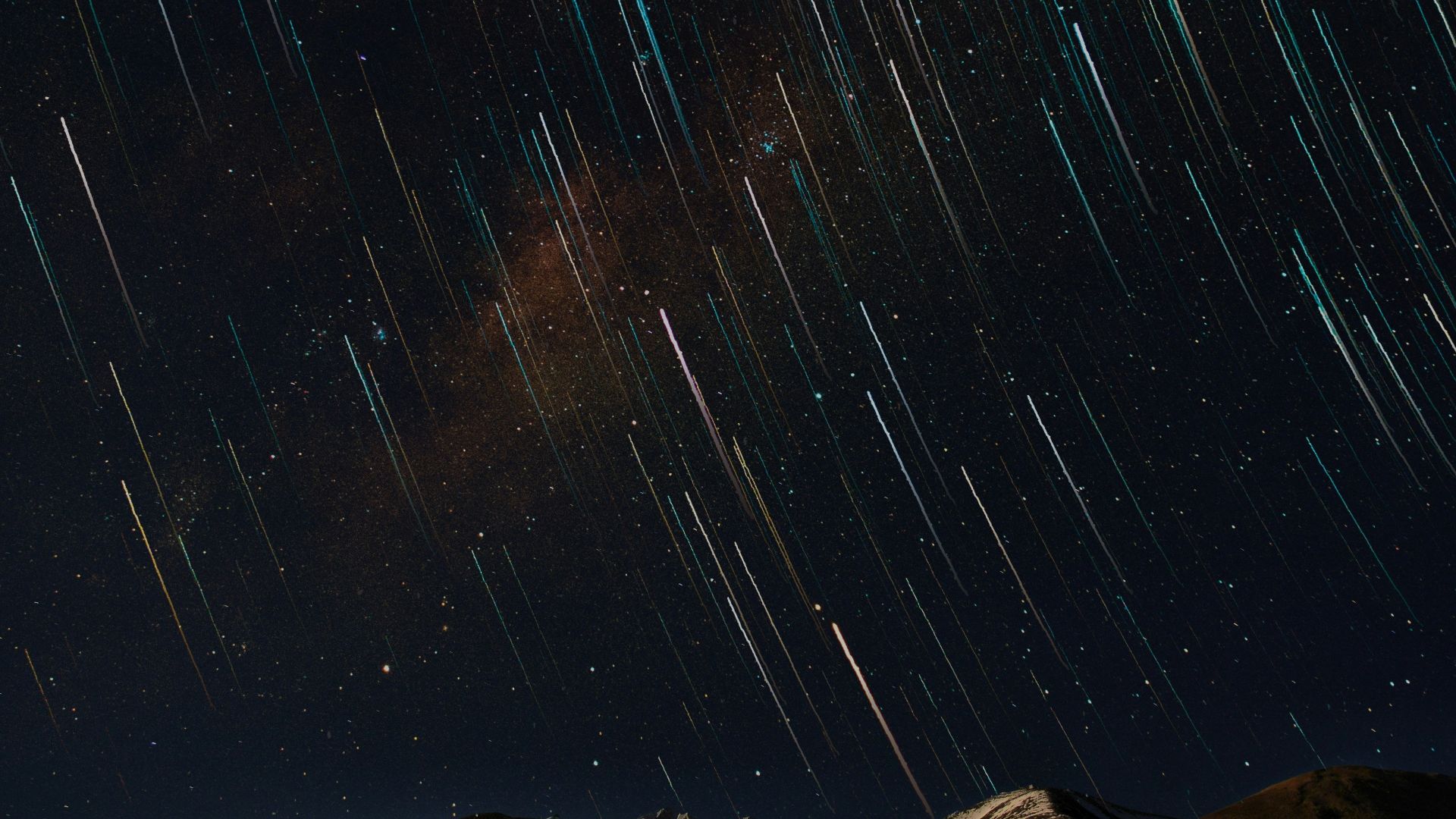 time lapse photoraphy of desert with stars