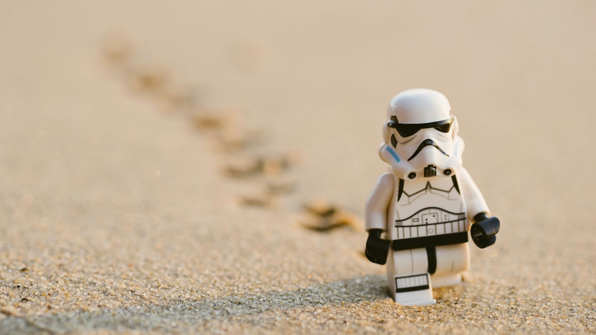 Stormtrooper minifigure walking on the sand