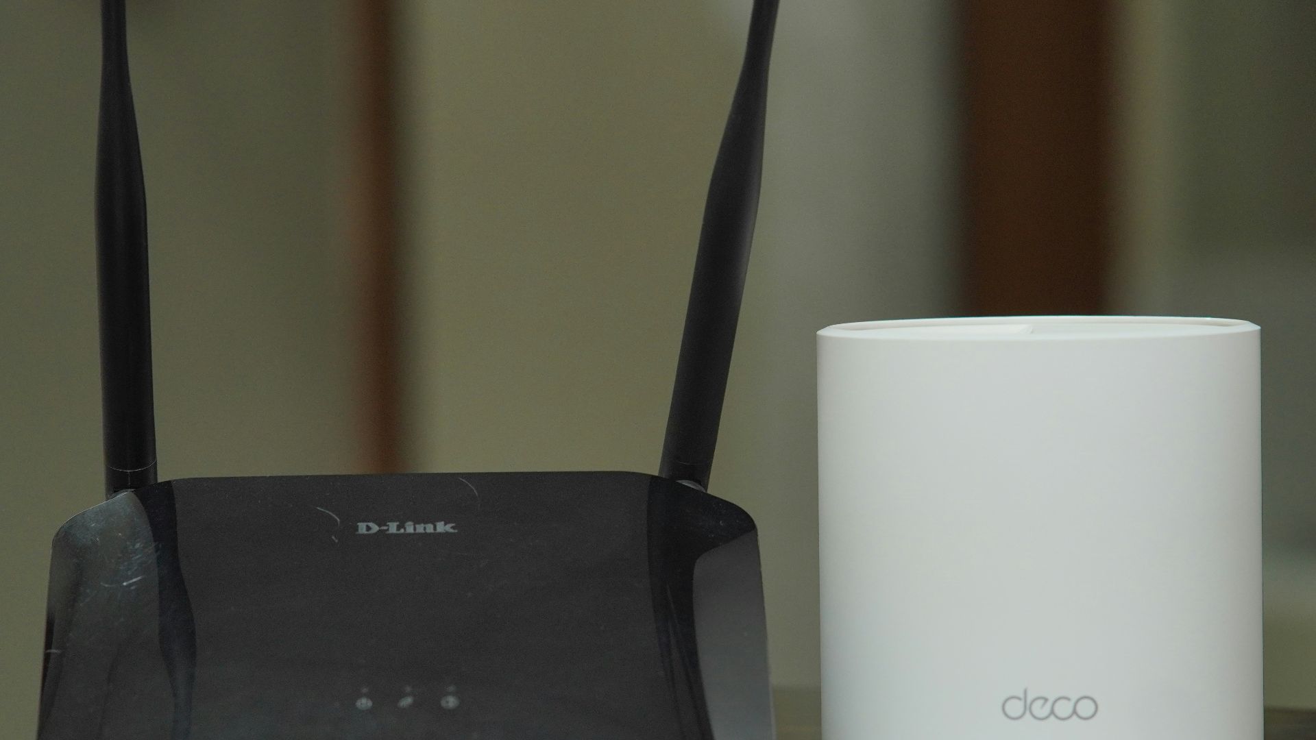 a couple of routers sitting on top of a table