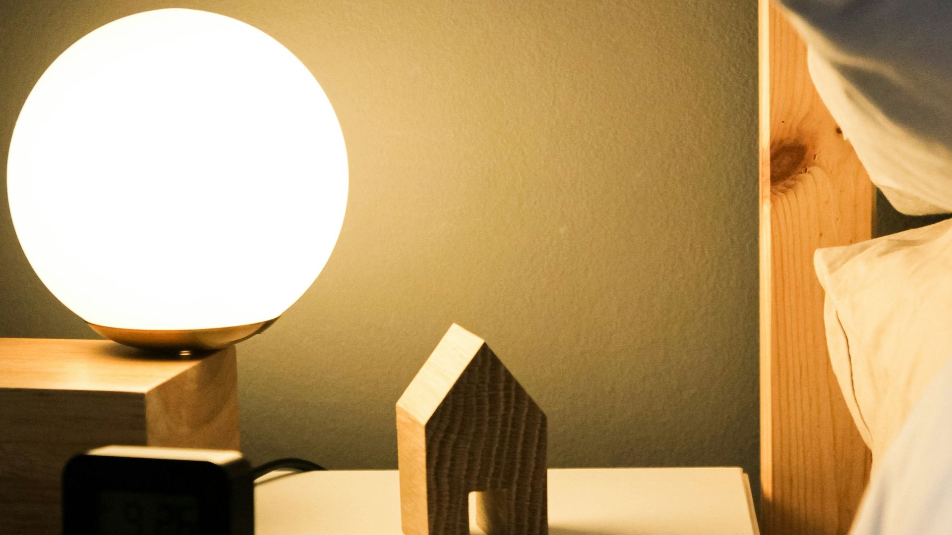 black digital alarm clock at 11 00