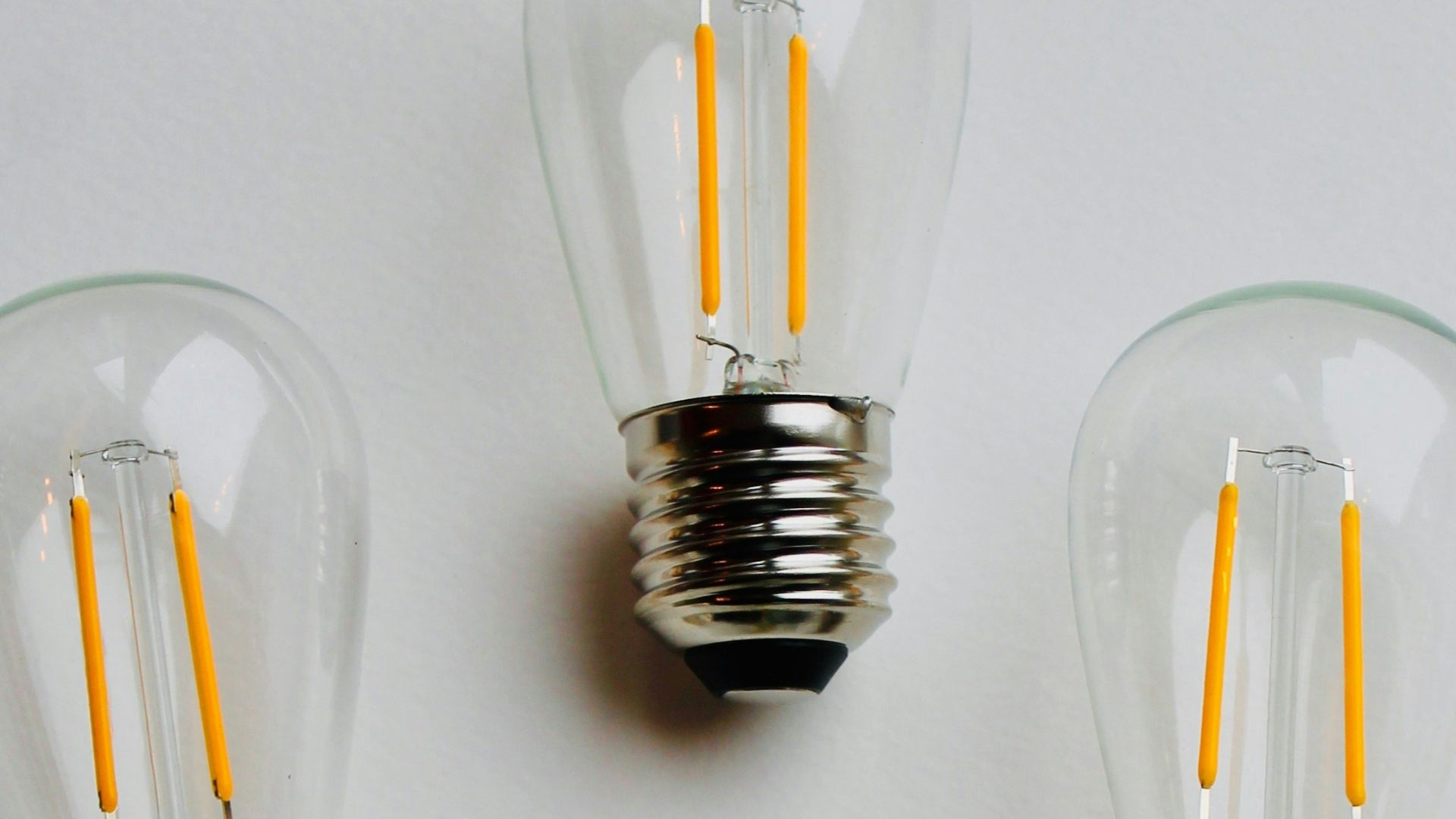 clear glass jar with silver and gold lid