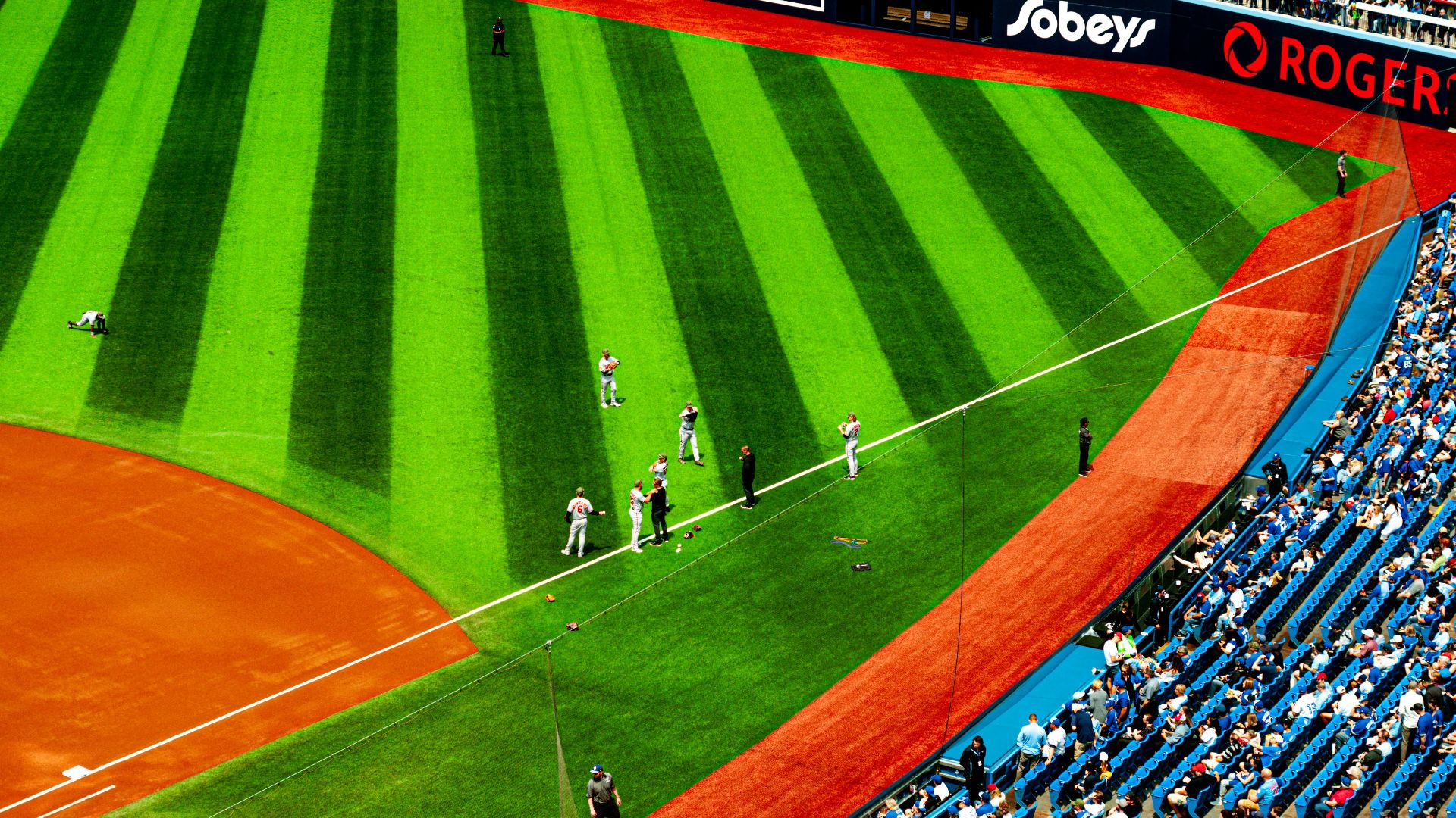 a baseball stadium filled with lots of people