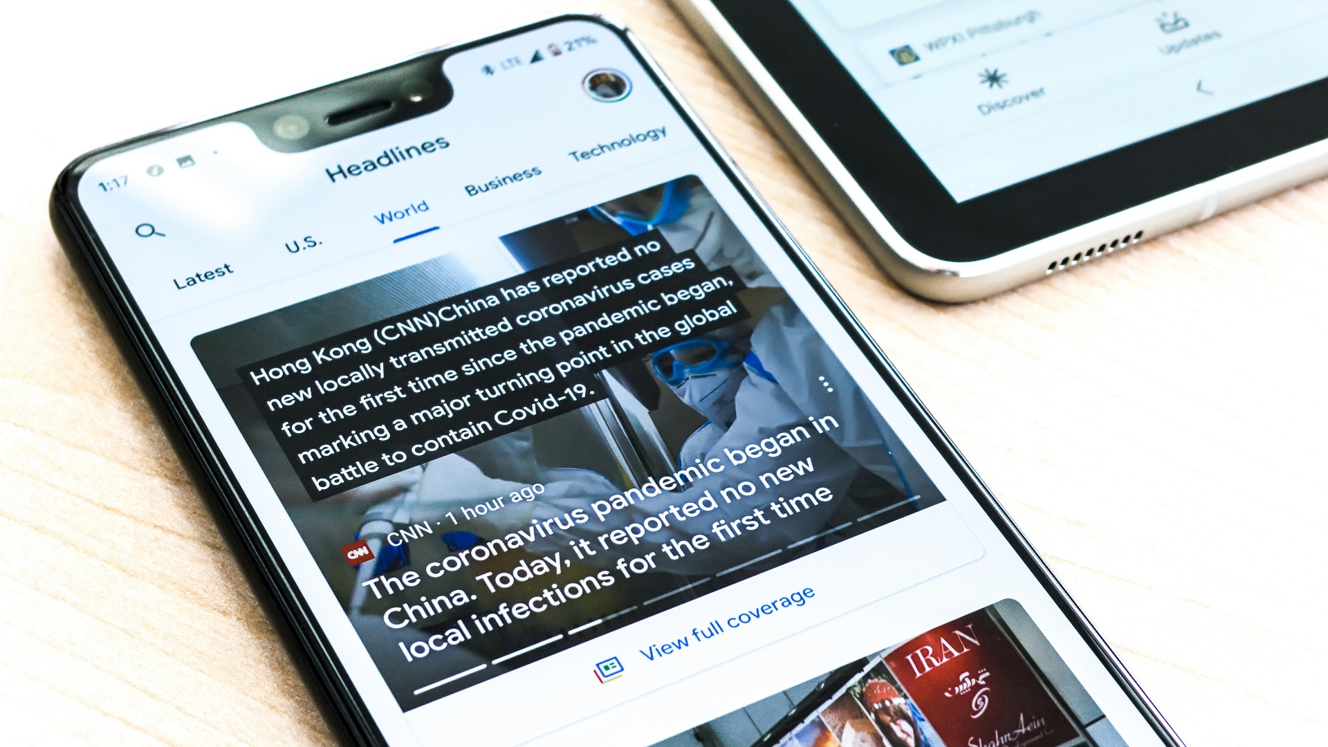 silver iphone 6 on brown wooden table