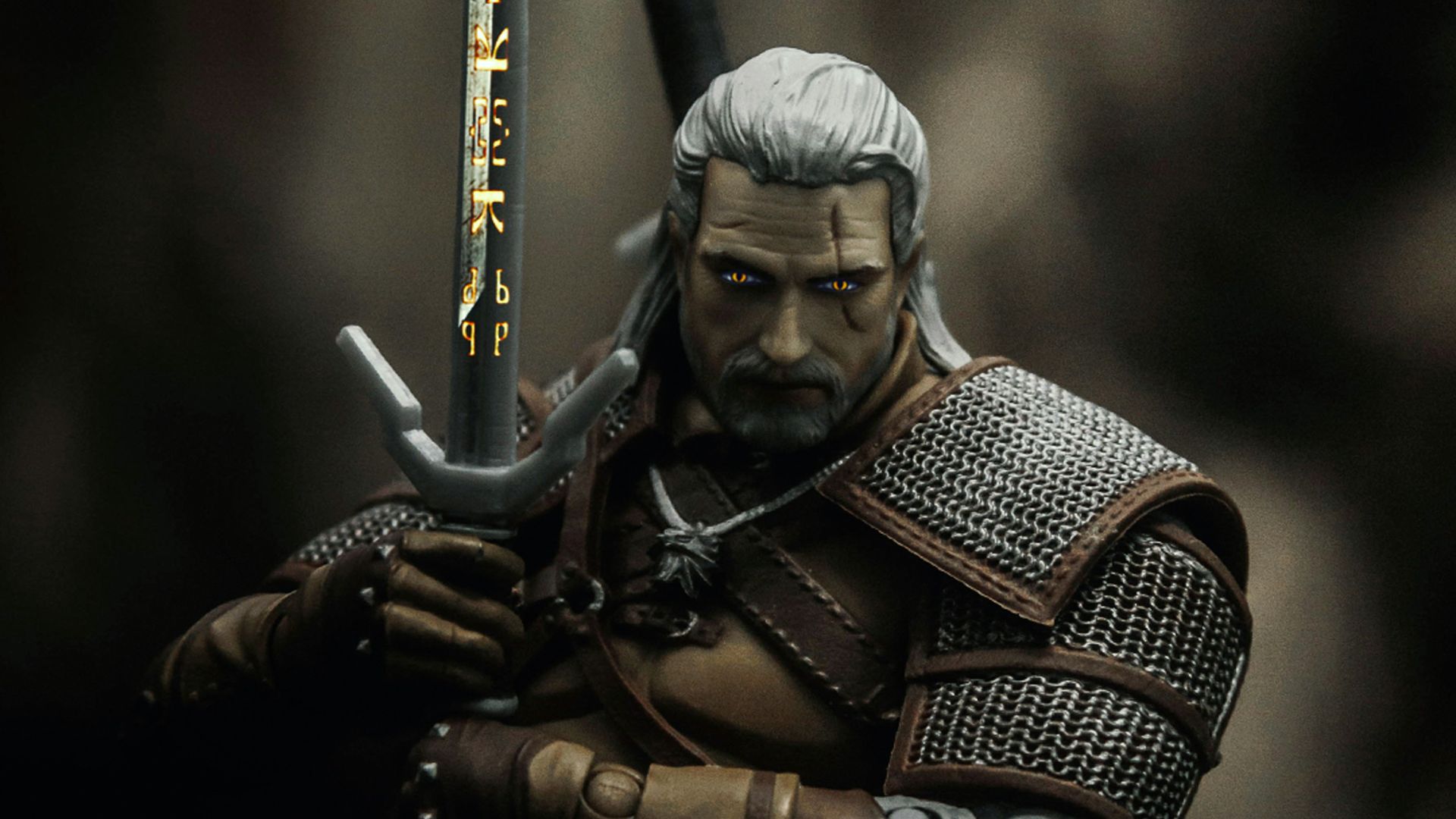 man in black and brown suit holding sword