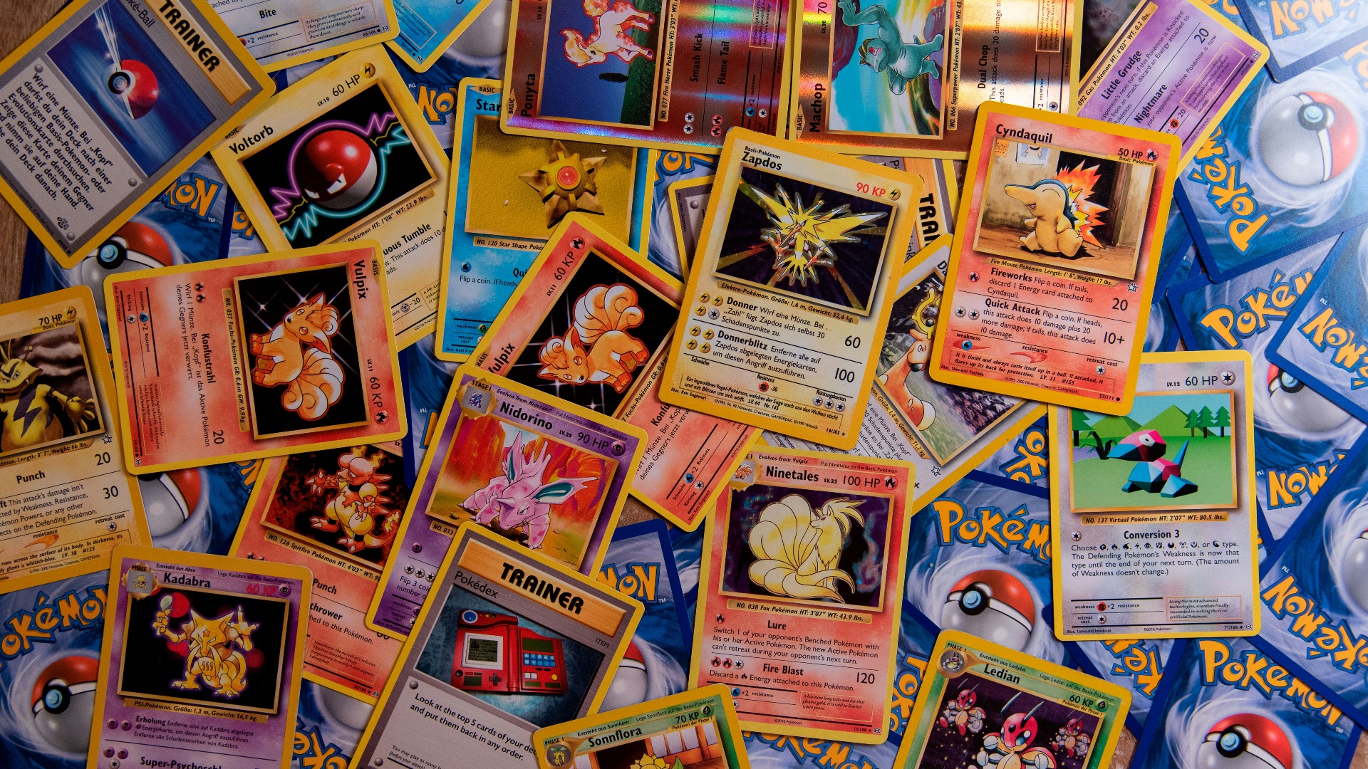 brown wooden framed photos on brown wooden table