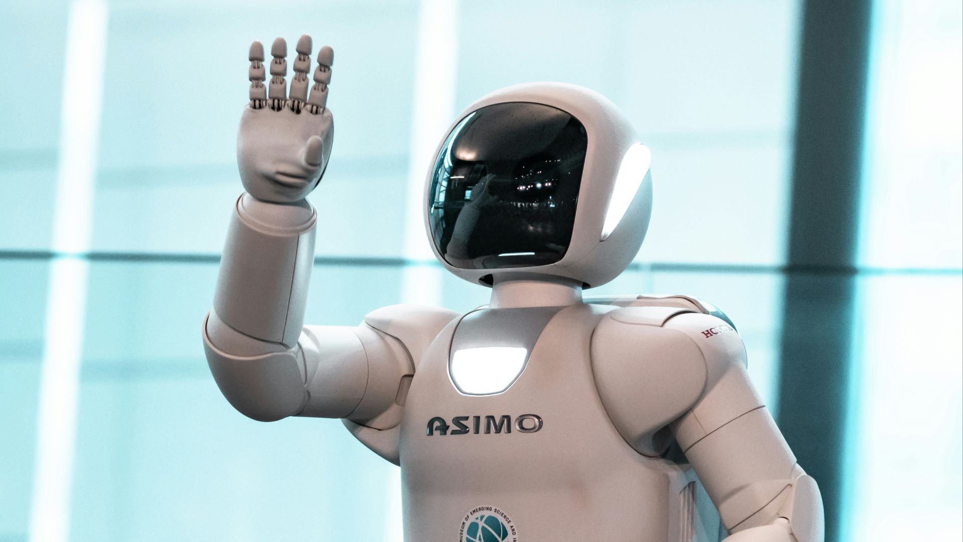 person in orange and white robot costume