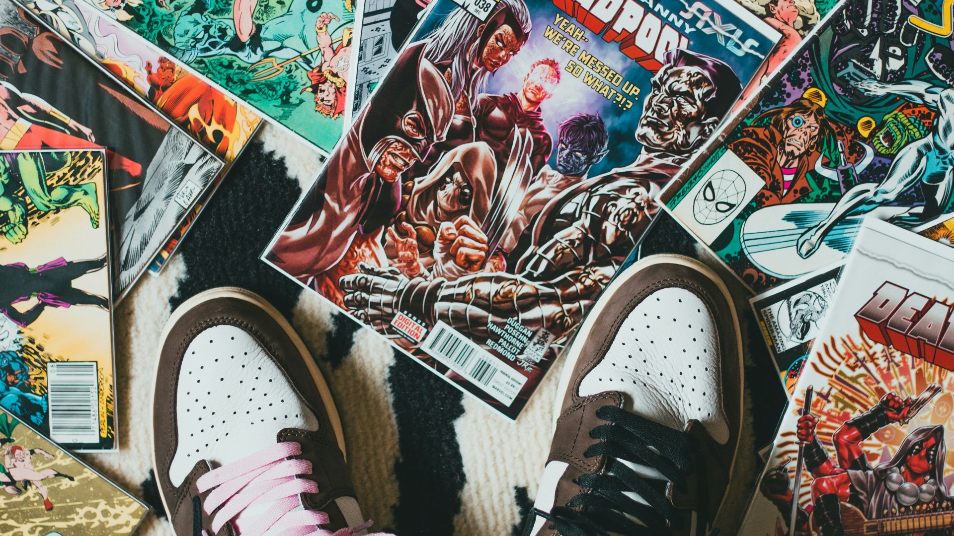 person wearing black and white sneakers