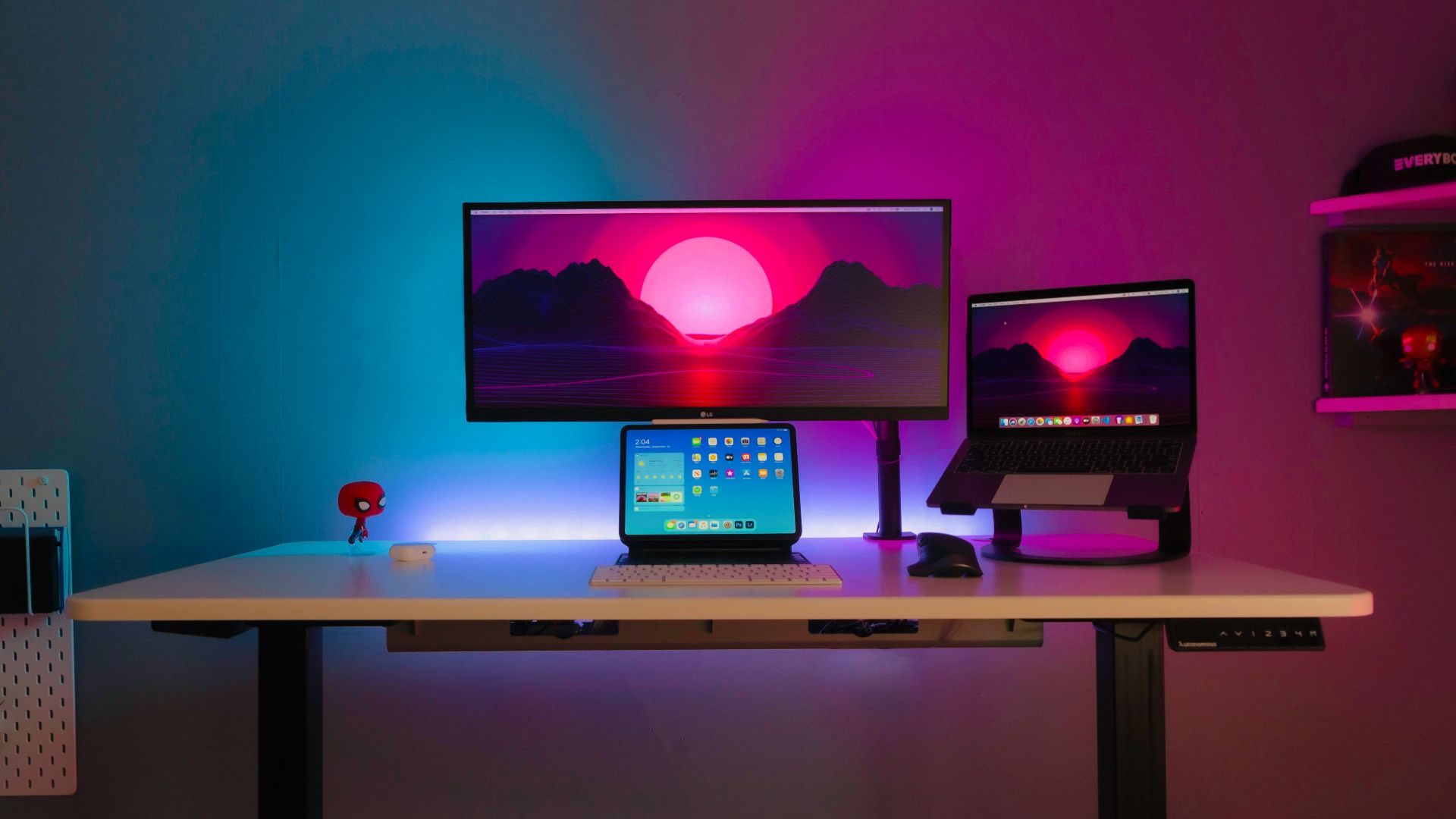 black flat screen computer monitor on brown wooden desk