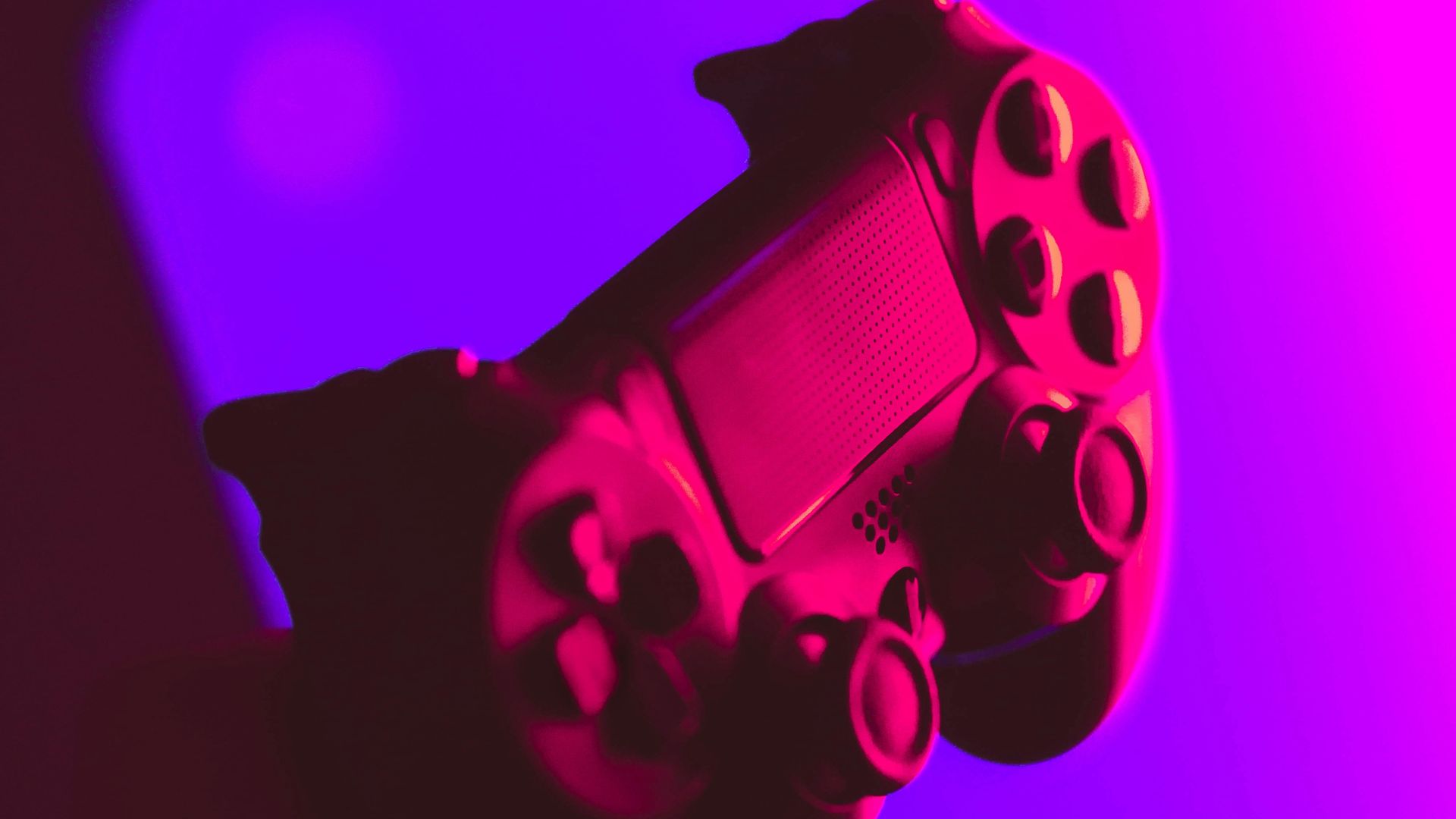 person holding black and gray game controller