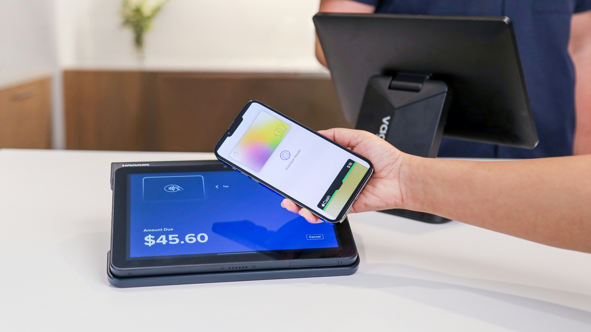 Mobile payment being made at the checkout.