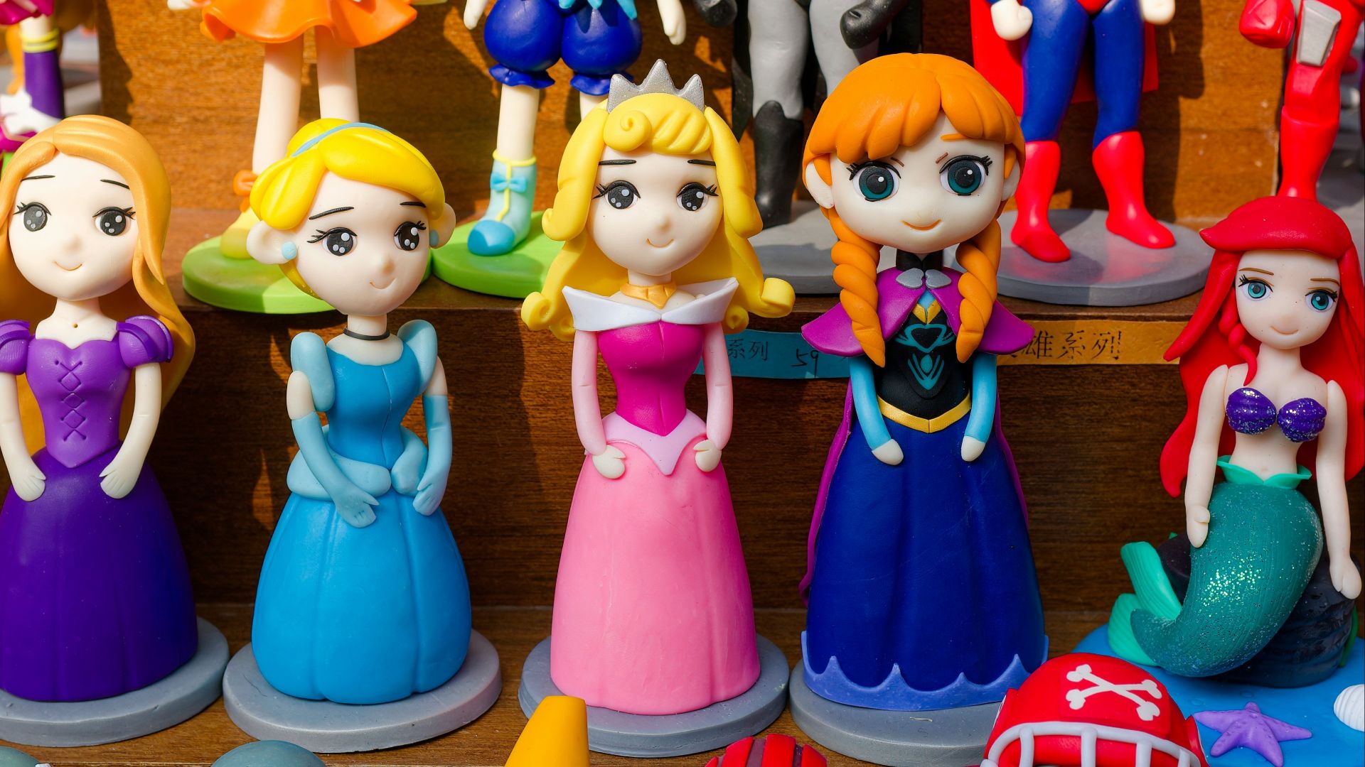 A bunch of toy figurines that are on a table