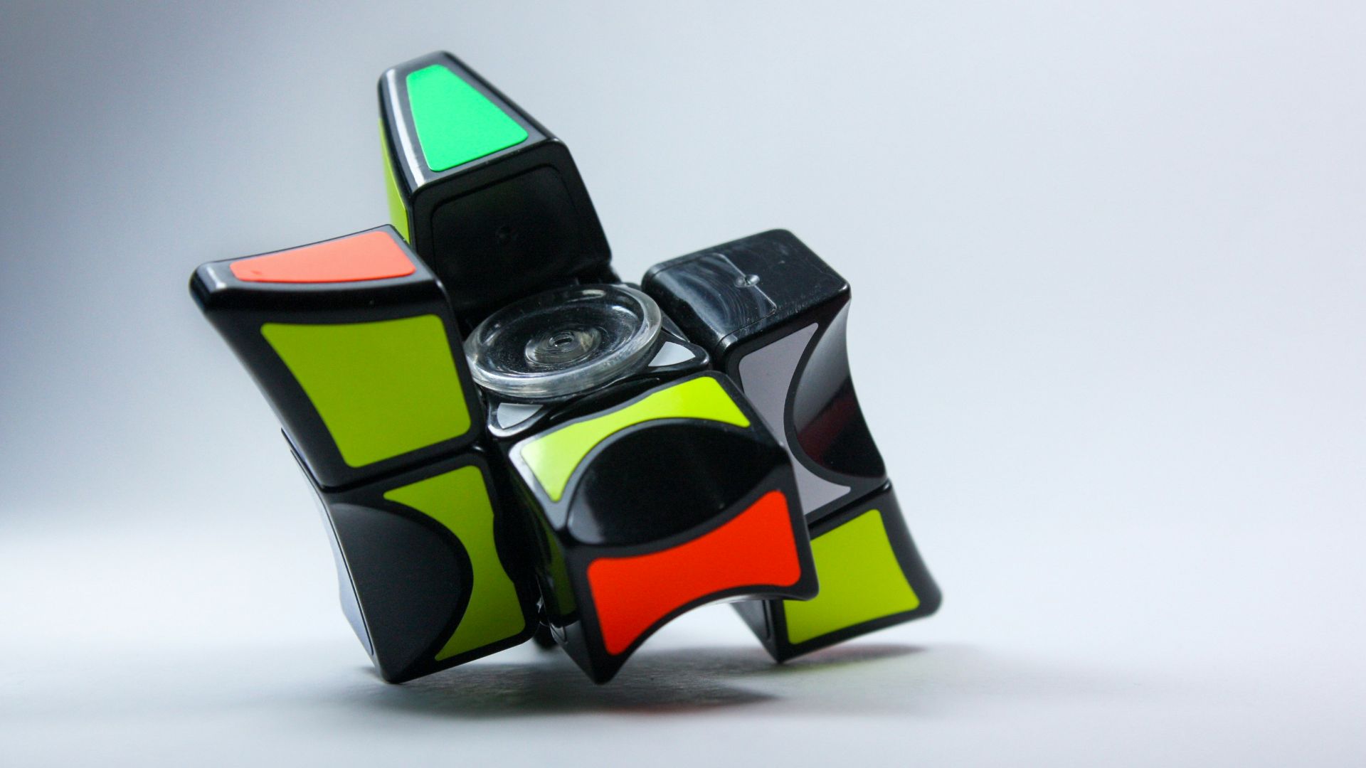 a multicolored object with a camera on top of it