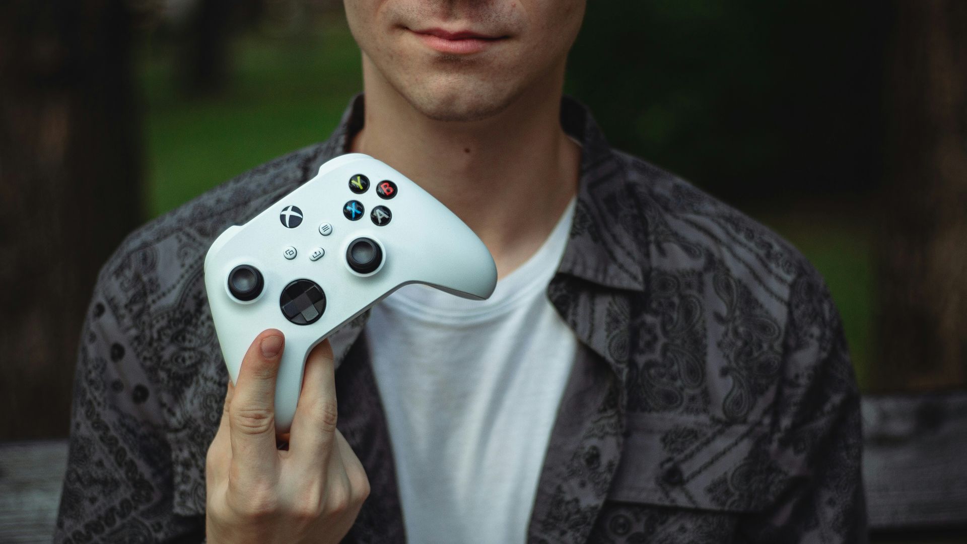 a person holding a video game controller