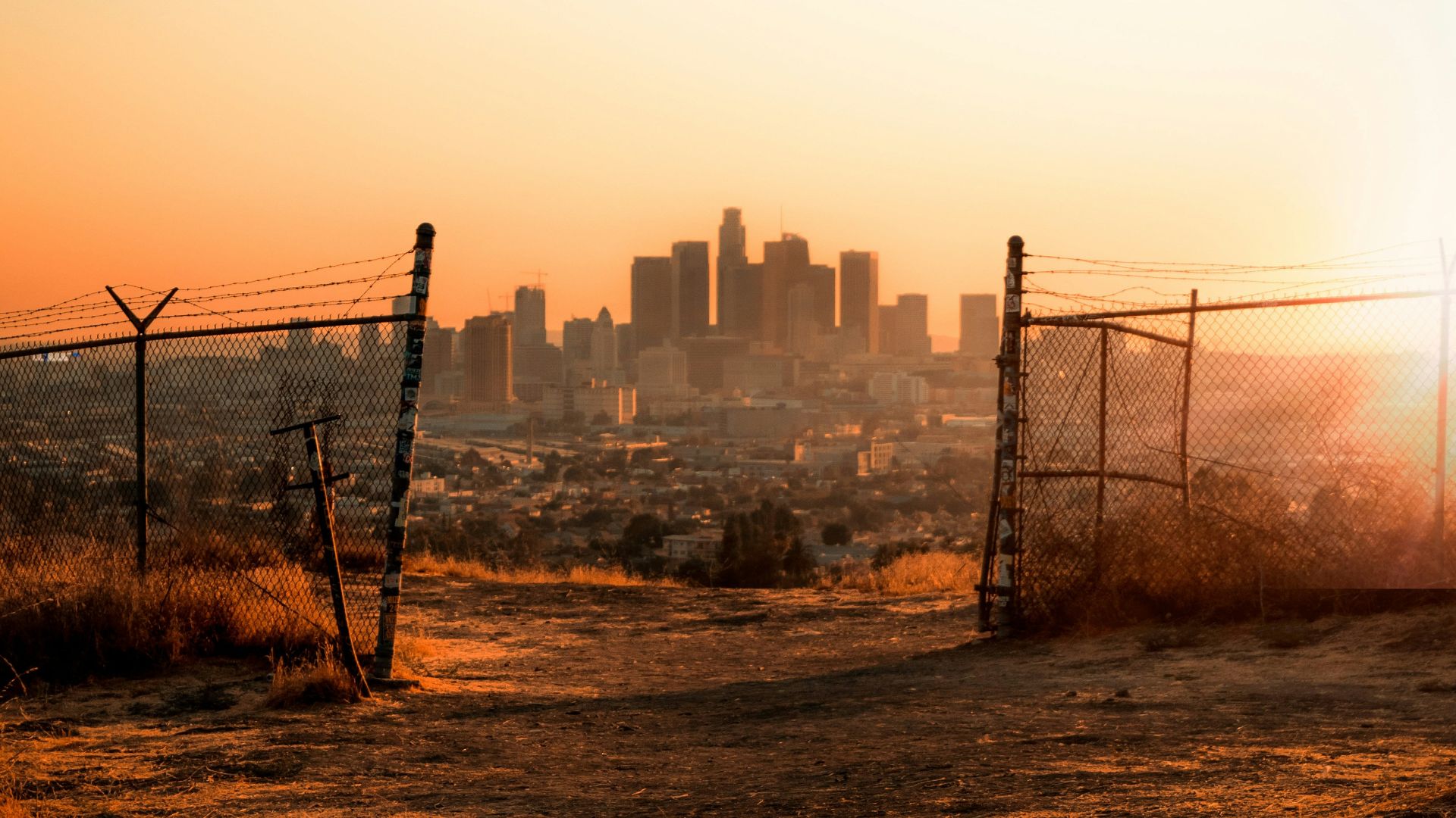 black metal fence near building during daytime