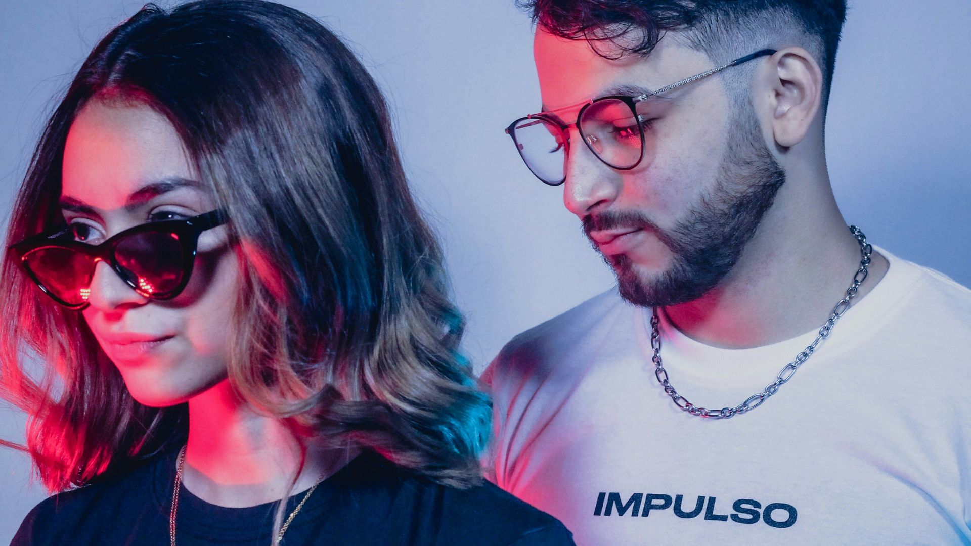 man in black crew neck t-shirt beside woman in white crew neck t-shirt