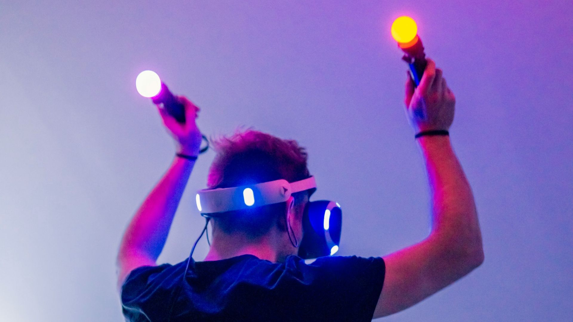 man playing using VR headset