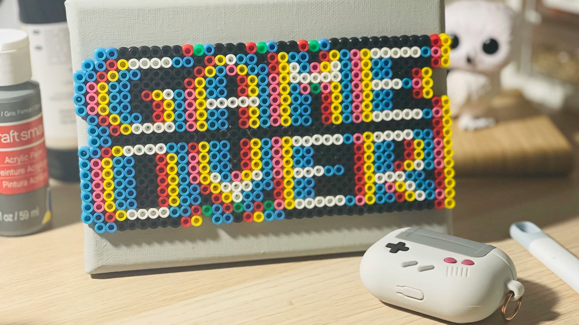 a nintendo wii game controller sitting on top of a table