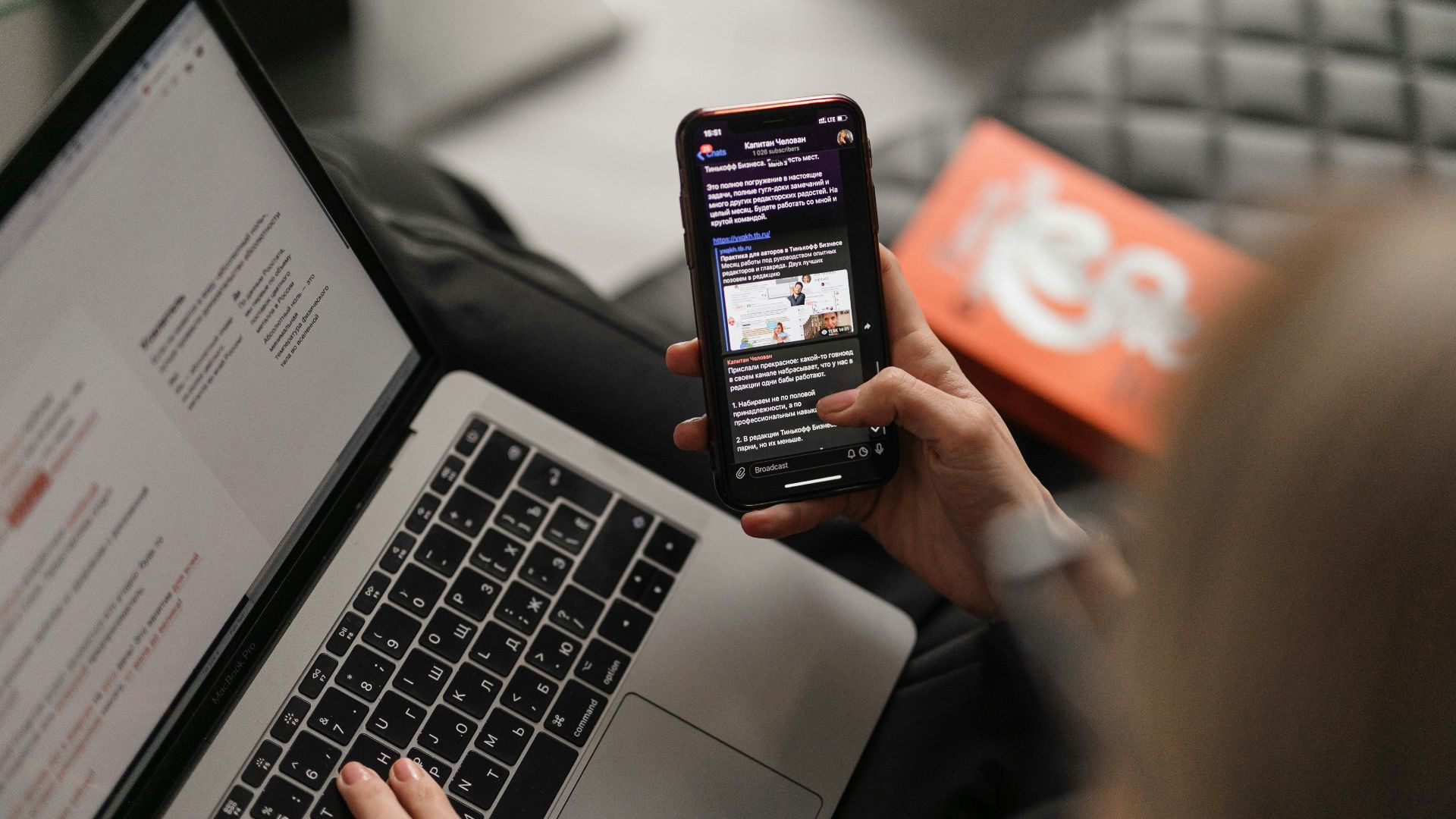 person holding black iphone 4