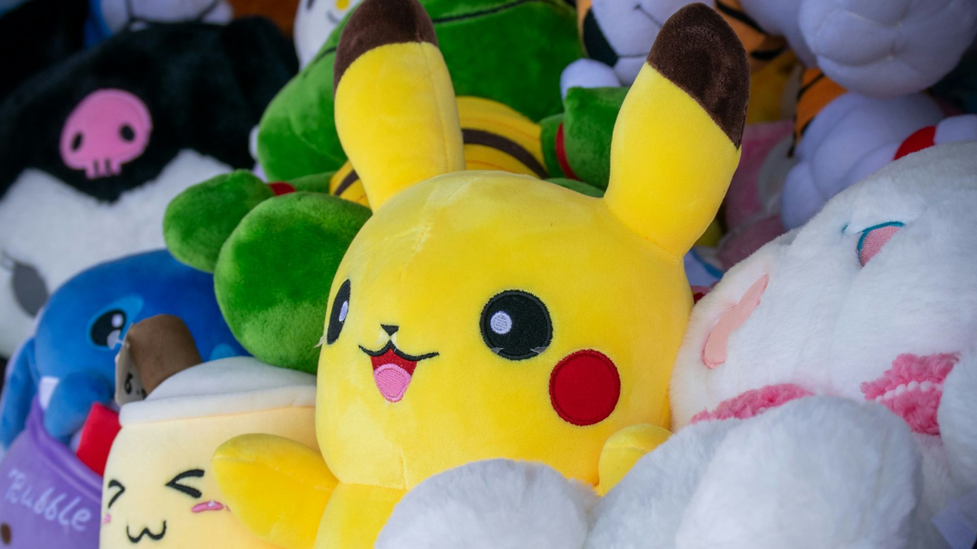 a bunch of stuffed animals that are on a table