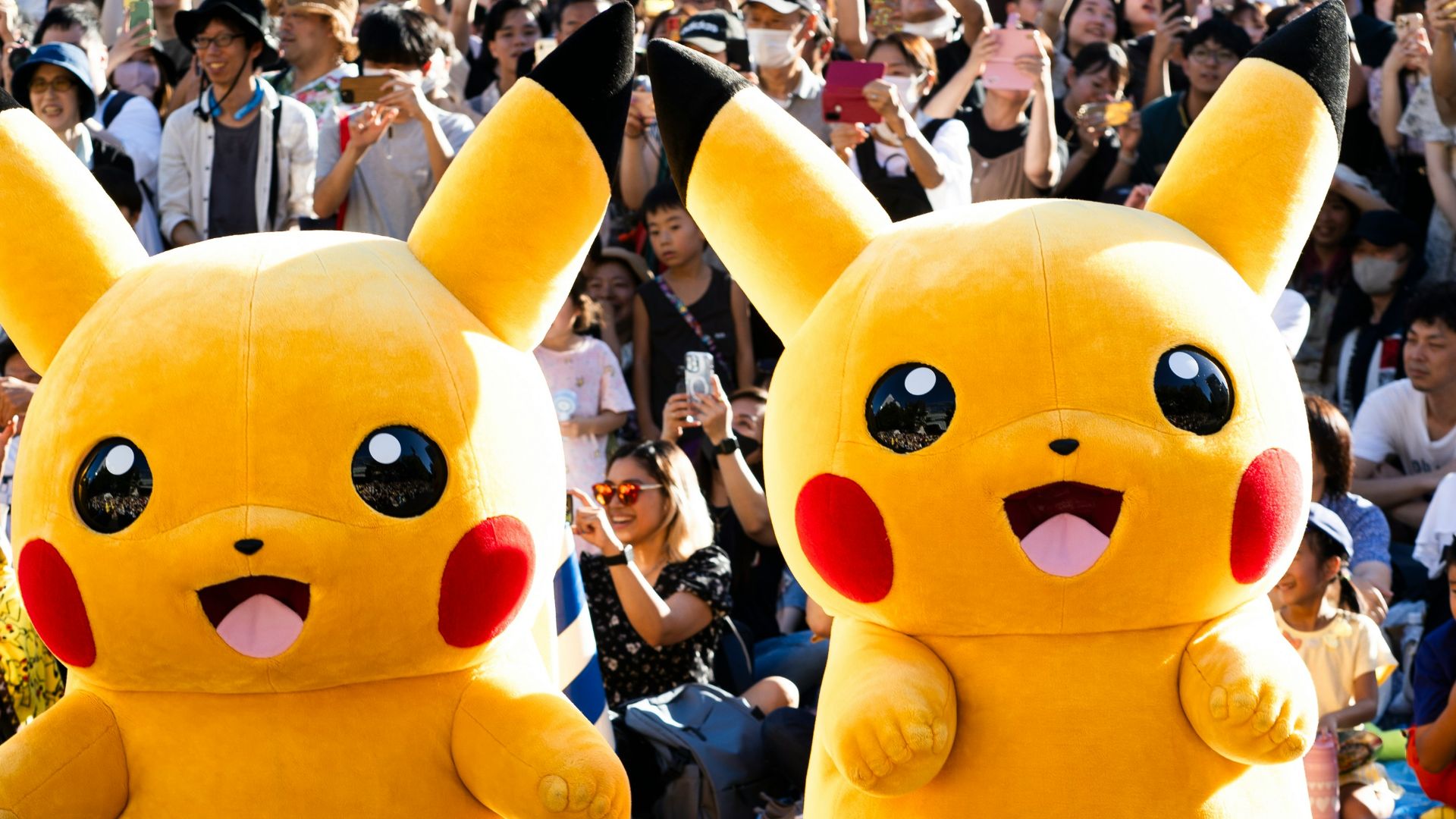 A large group of people watching a parade