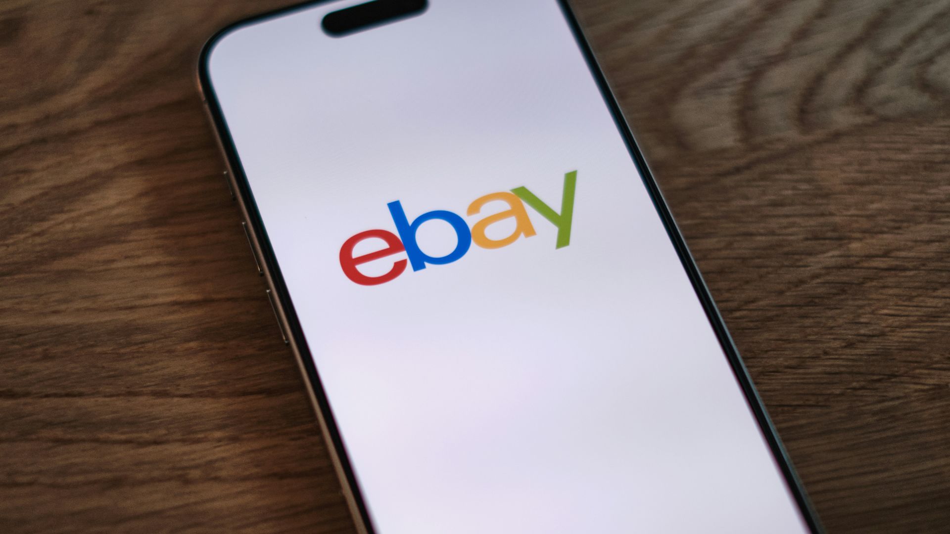 A close up of a cell phone on a table