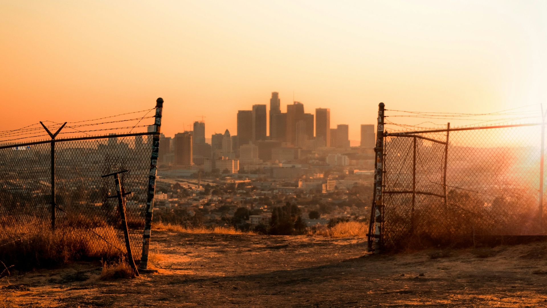 black metal fence near building during daytime