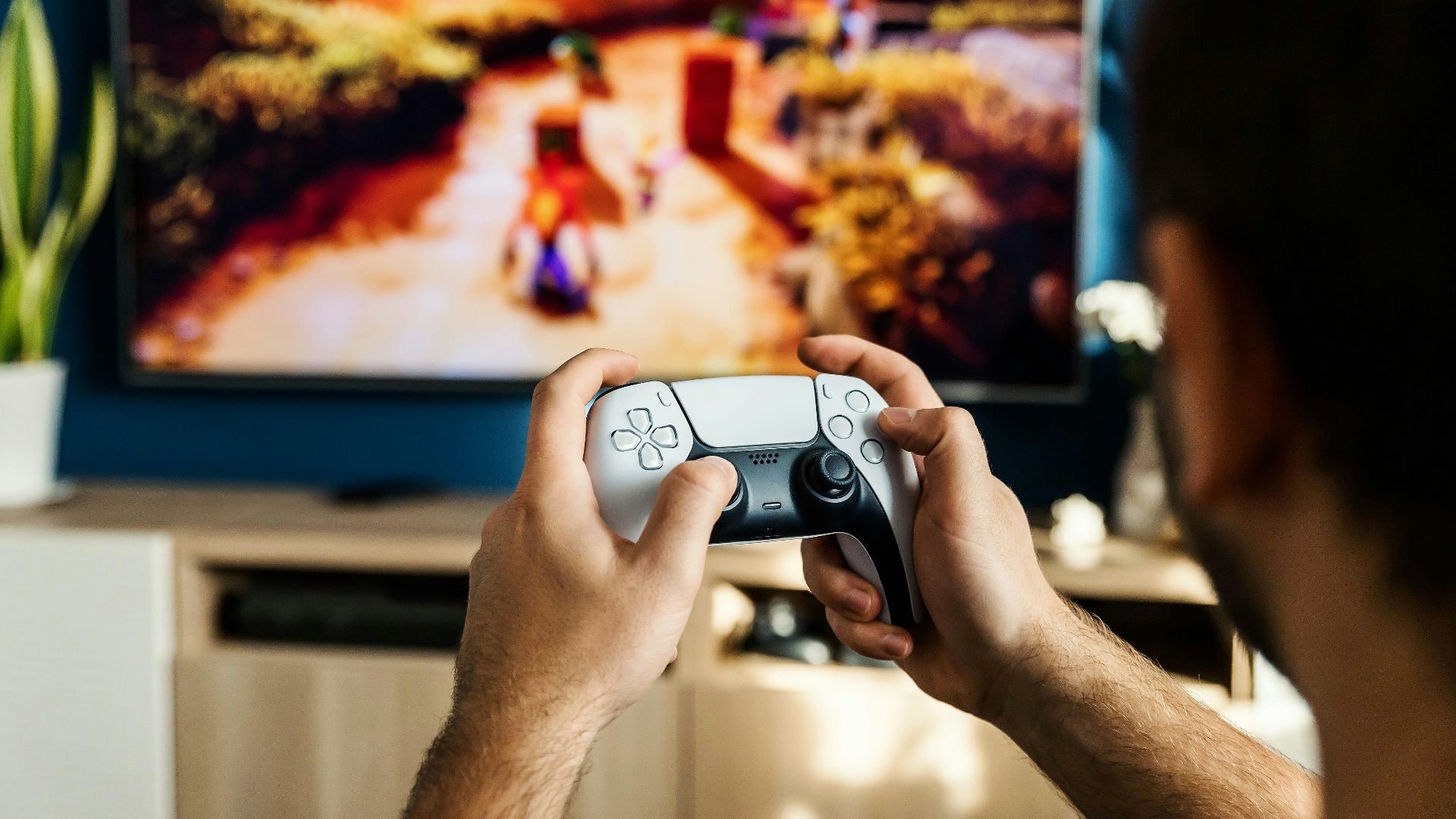 a man playing a video game on the nintendo wii