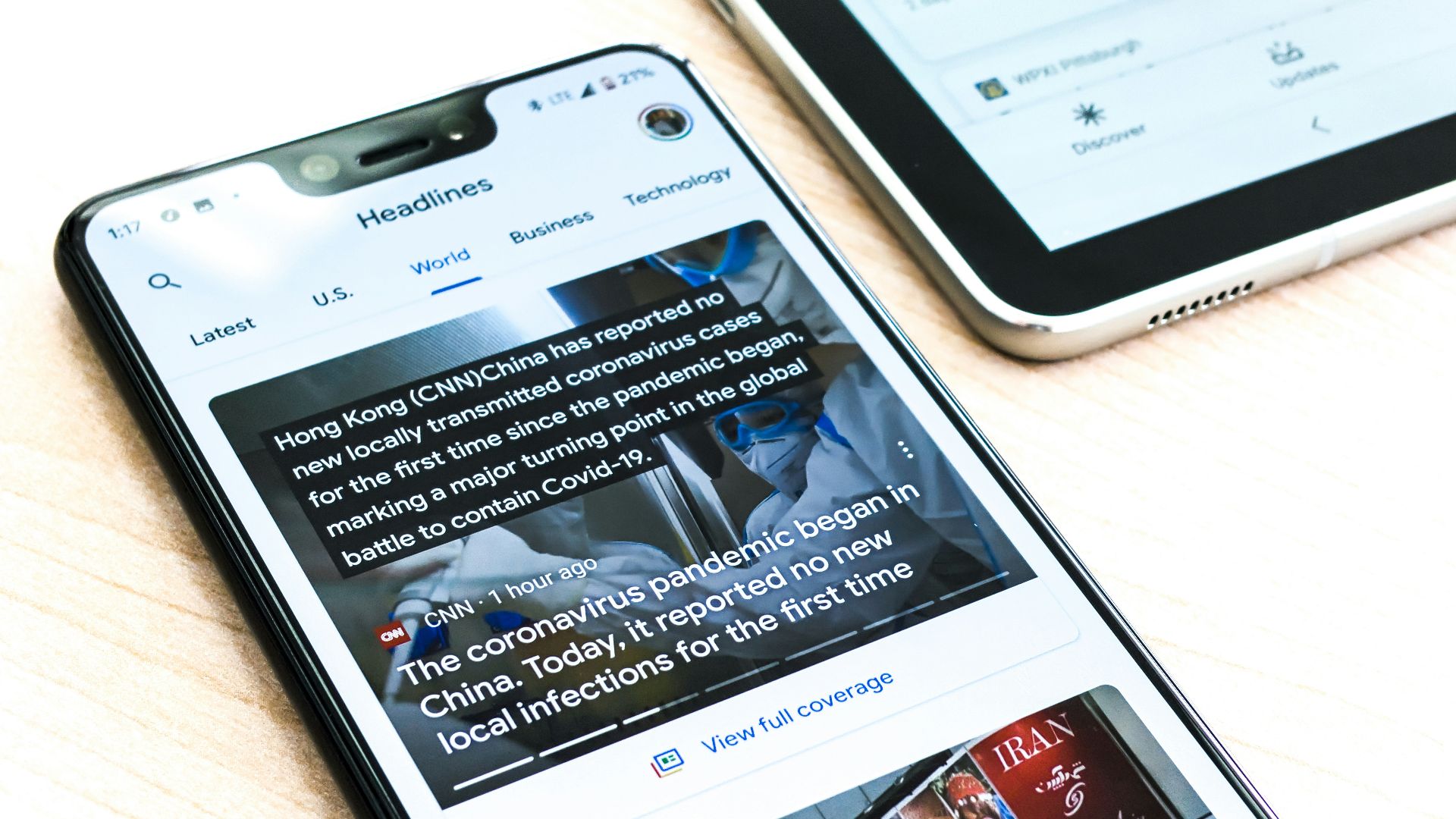 silver iphone 6 on brown wooden table