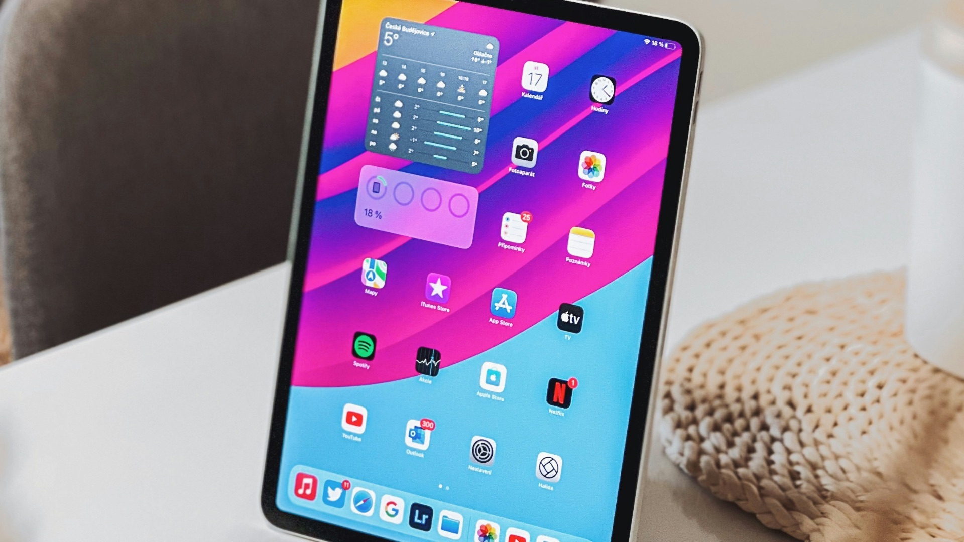 a tablet computer sitting on top of a table