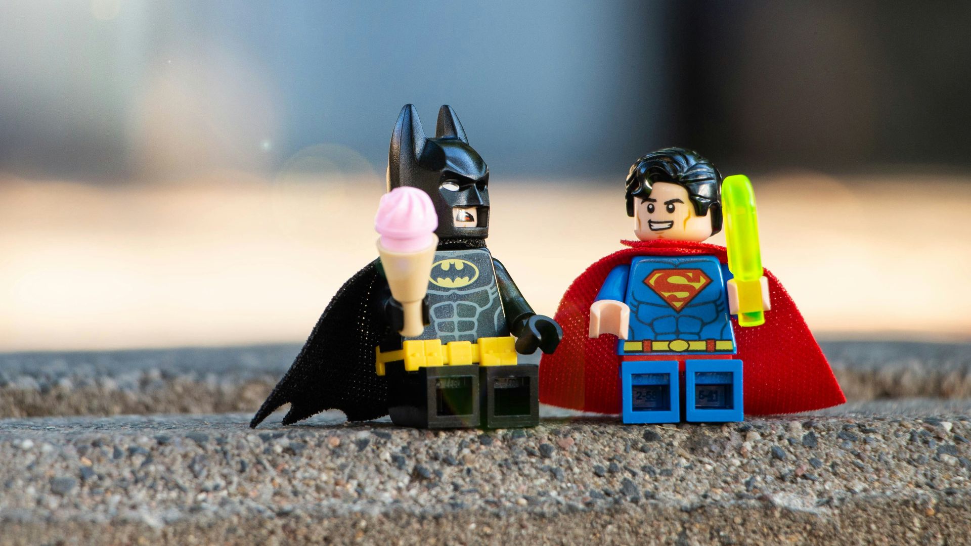 lego mini figure on brown sand