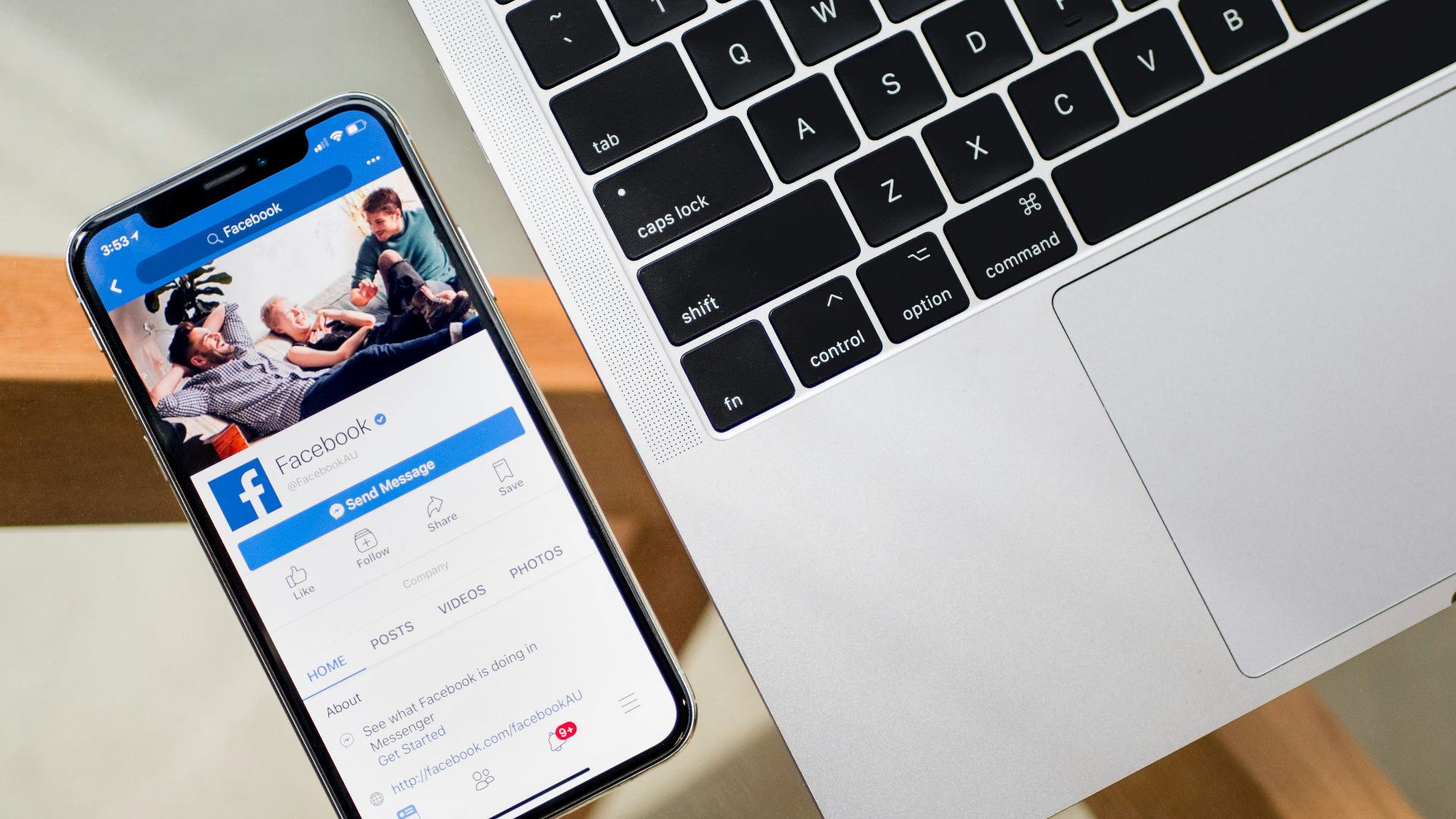 iPhone X beside MacBook