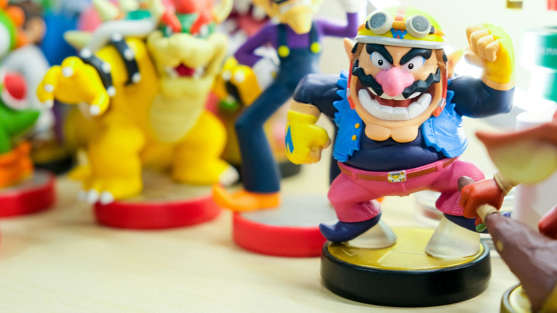 Super Mario vinyl figures on table