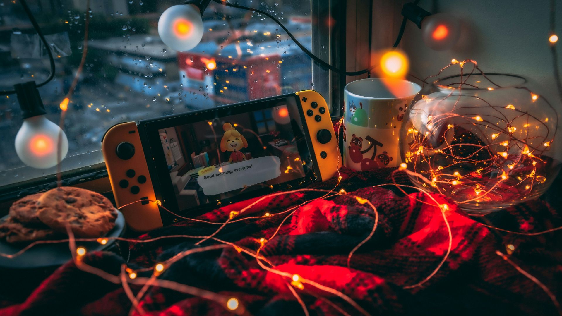 a video game console and a mug