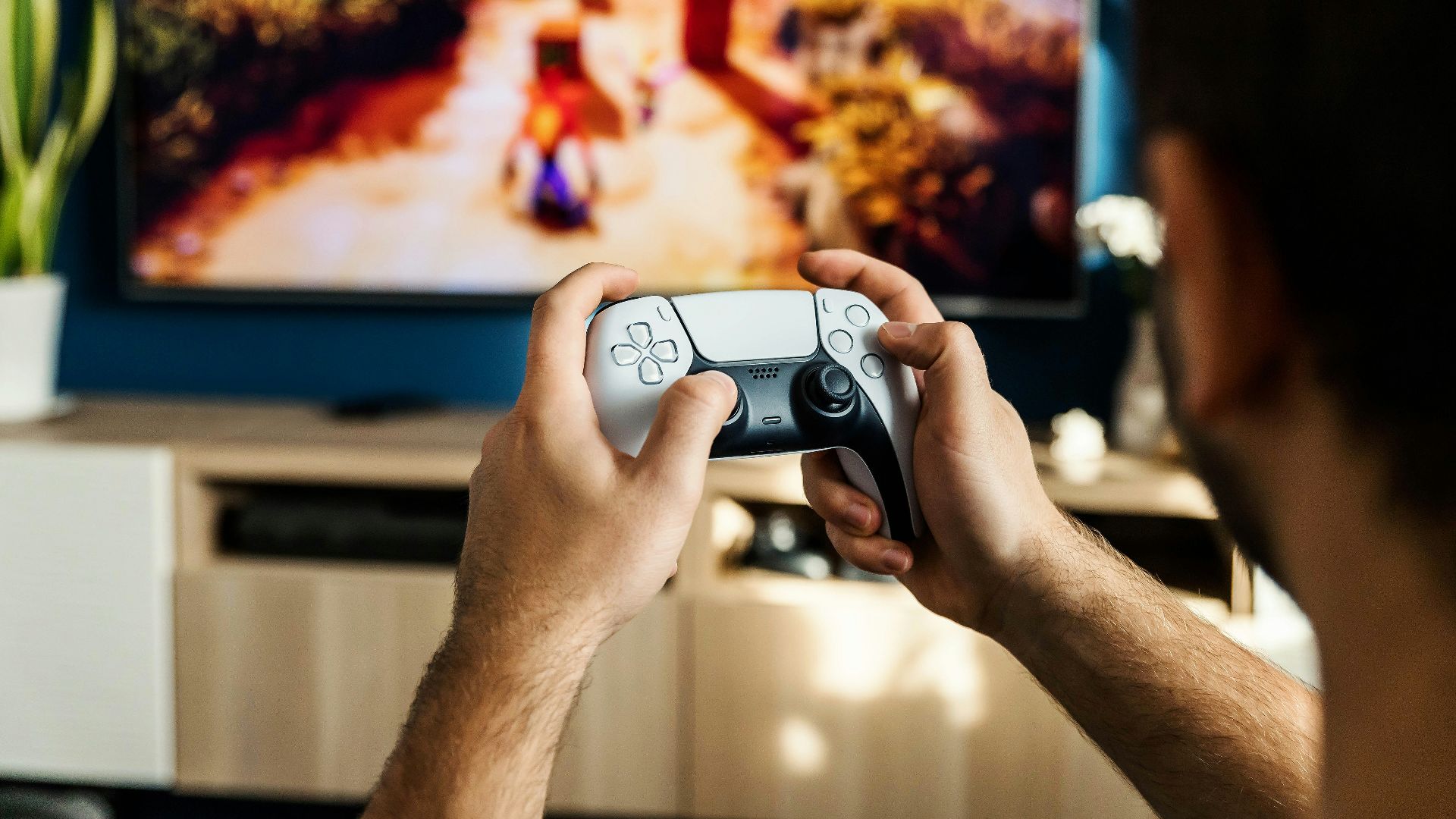 a man playing a video game on the nintendo wii